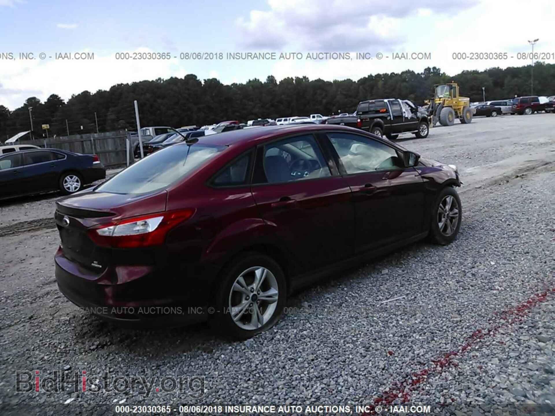 2014 Ford Focus - VIN: 1FADP3F20EL387099 - Фото 4