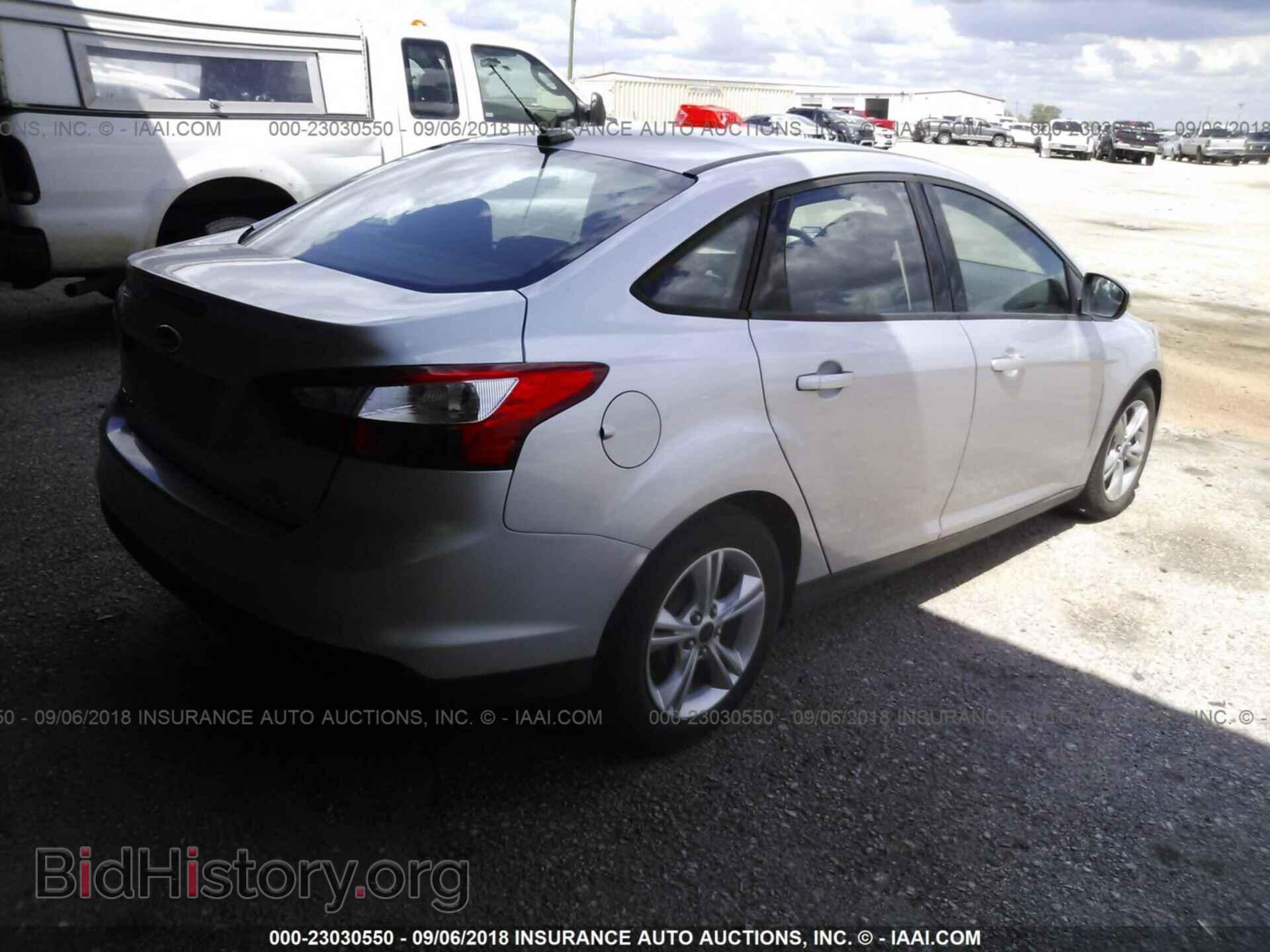 2014 Ford Focus - VIN: 1FADP3F27EL295729 - Photo 4