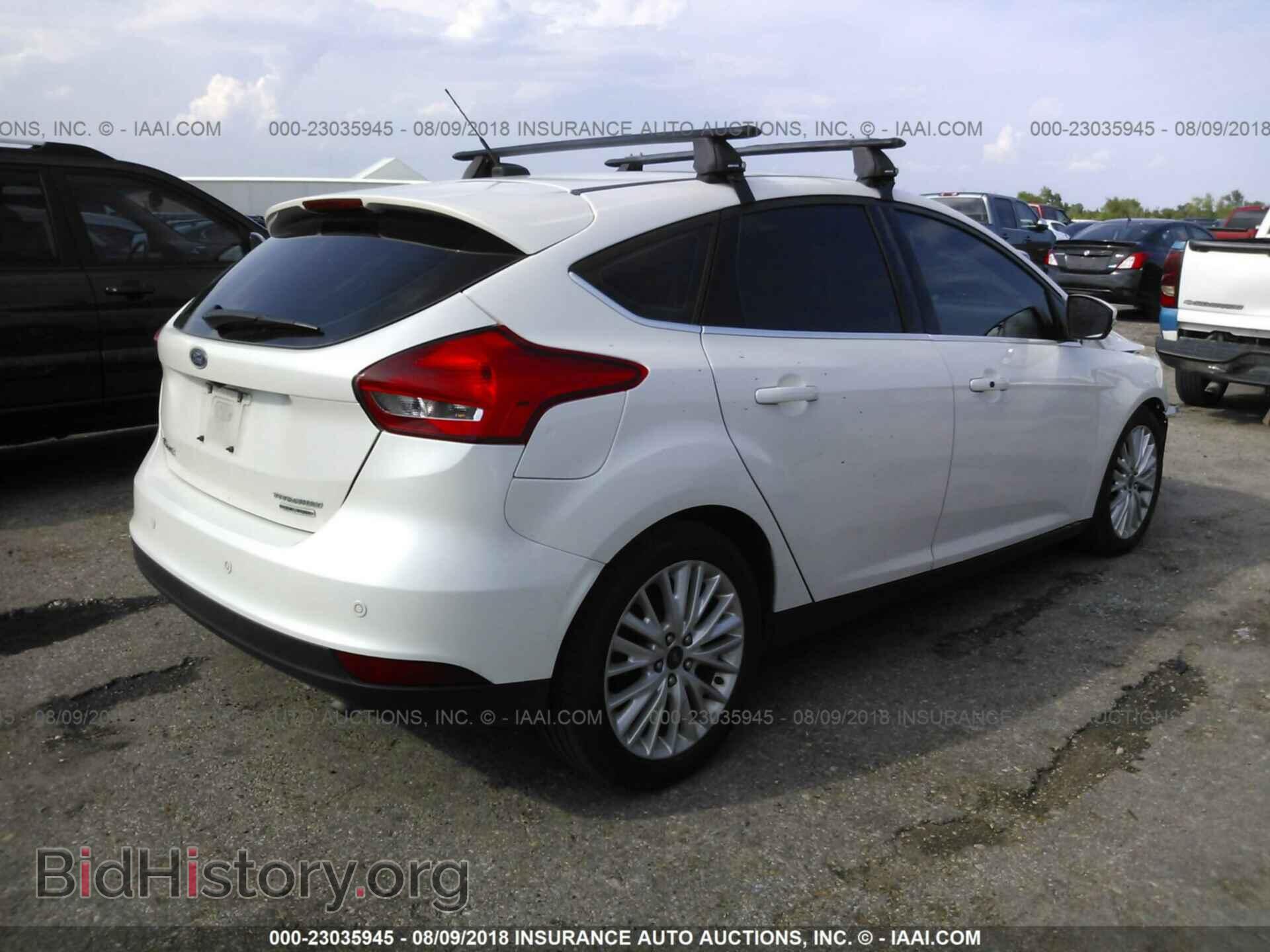 2015 Ford Focus - VIN: 1FADP3N26FL347919 - Photo 4