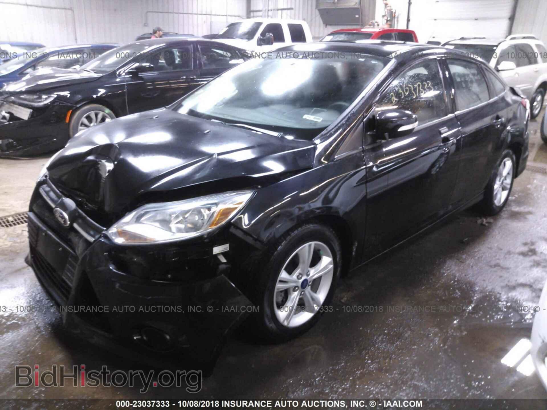2014 Ford Focus - VIN: 1FADP3F25EL441285 - Фото 2