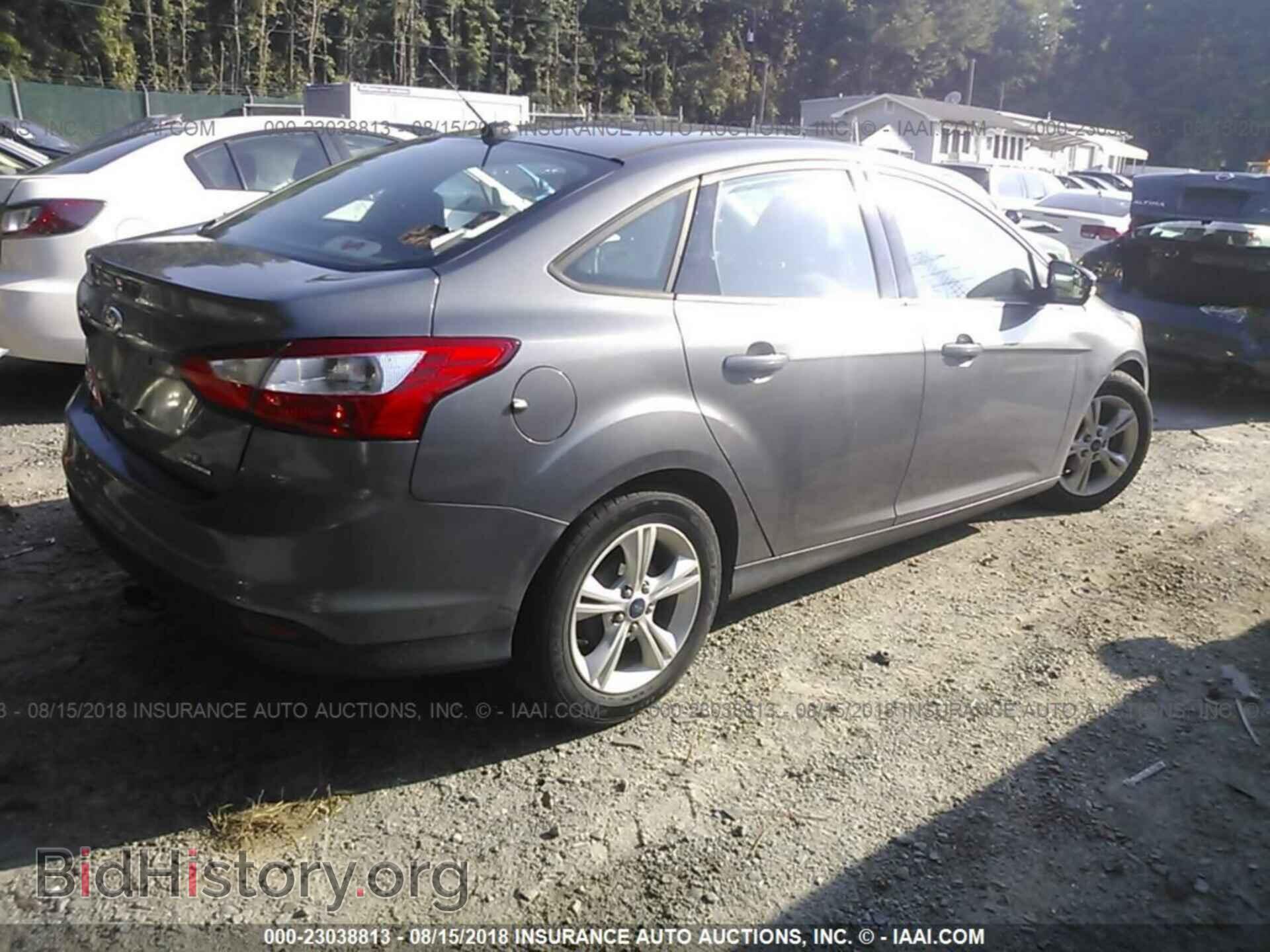 2014 Ford Focus - VIN: 1FADP3F23EL427126 - Photo 4