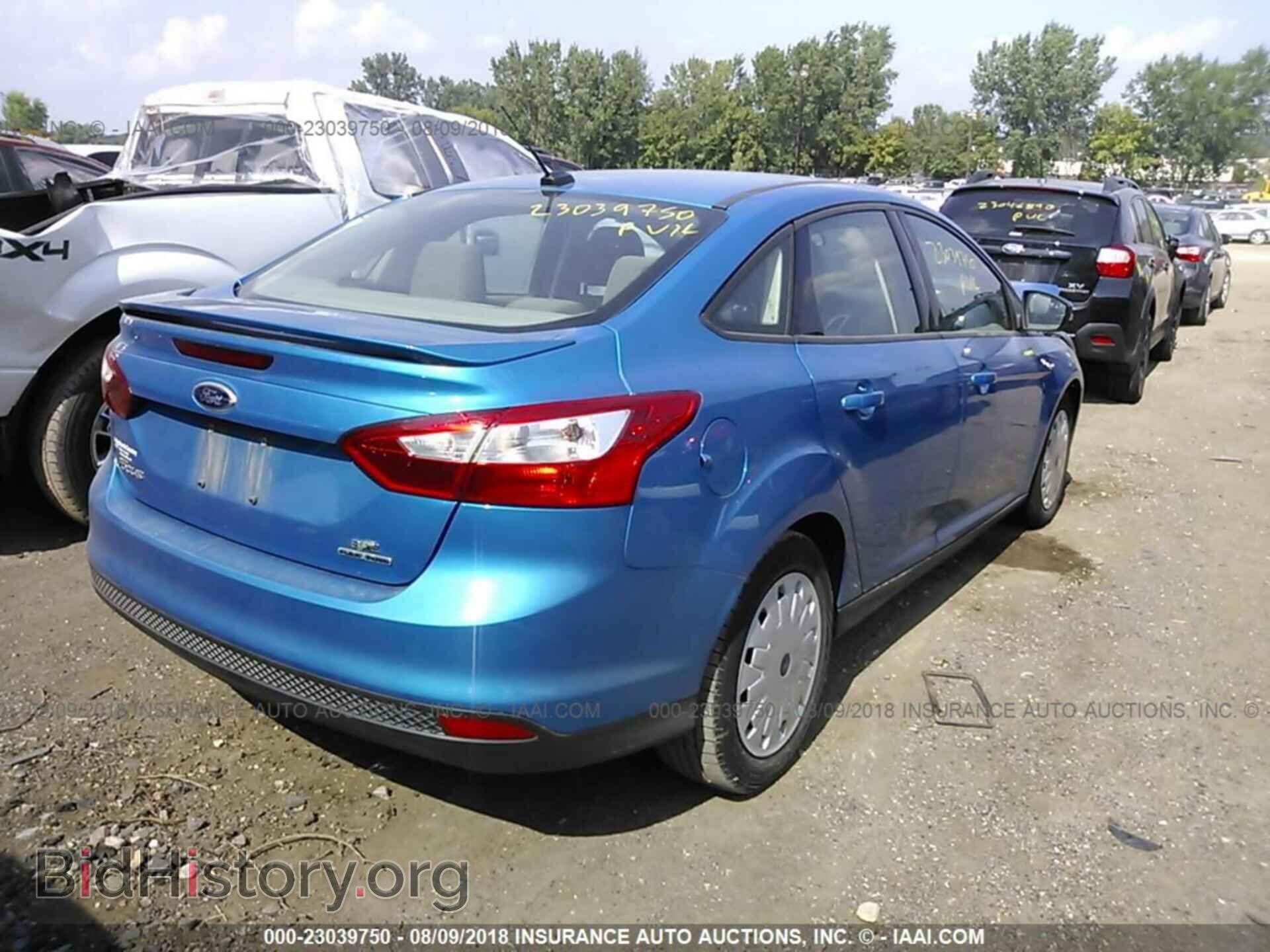 2013 Ford Focus - VIN: 1FADP3F2XDL210655 - Фото 4