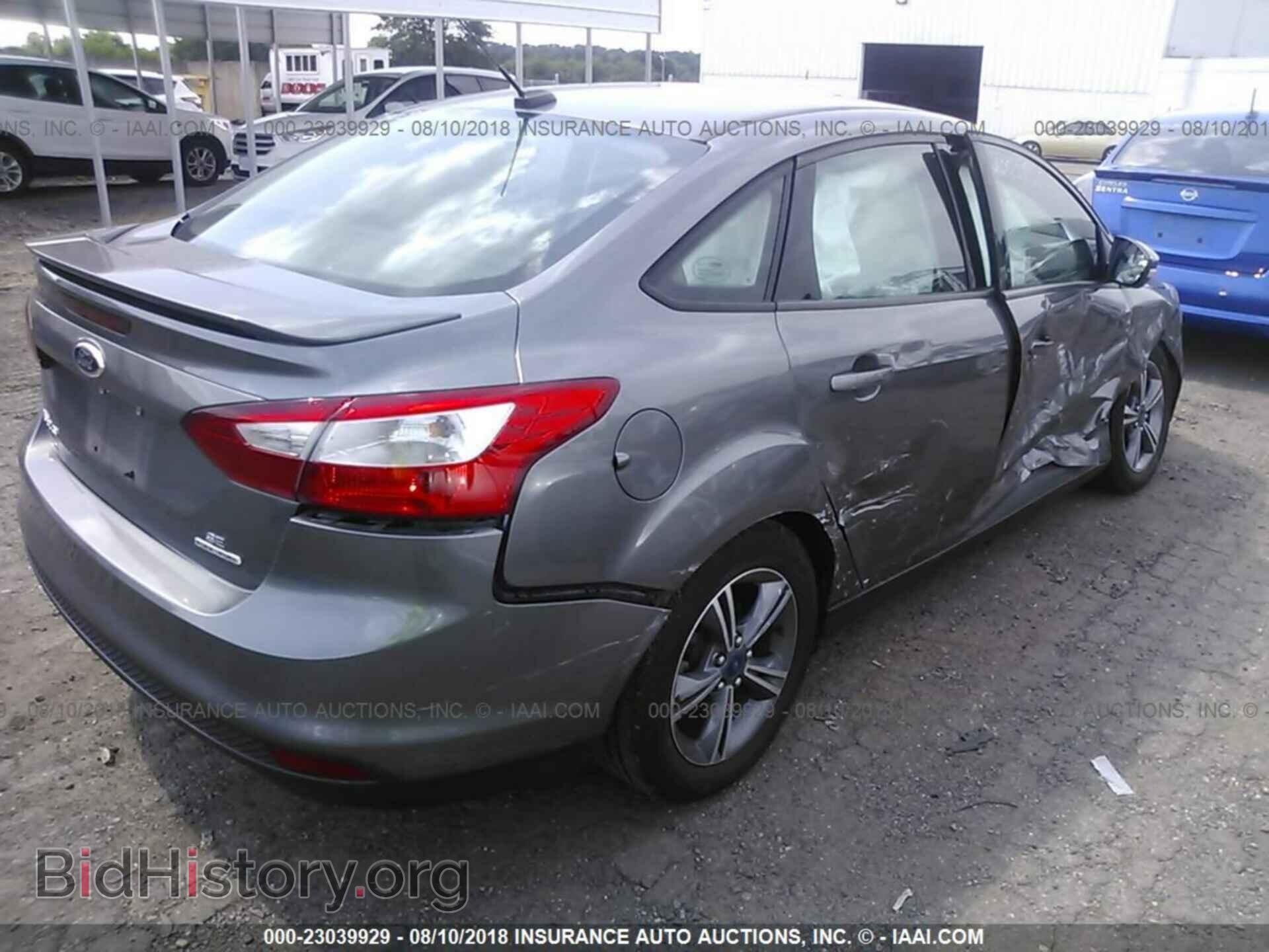 2014 Ford Focus - VIN: 1FADP3F24EL412389 - Photo 4