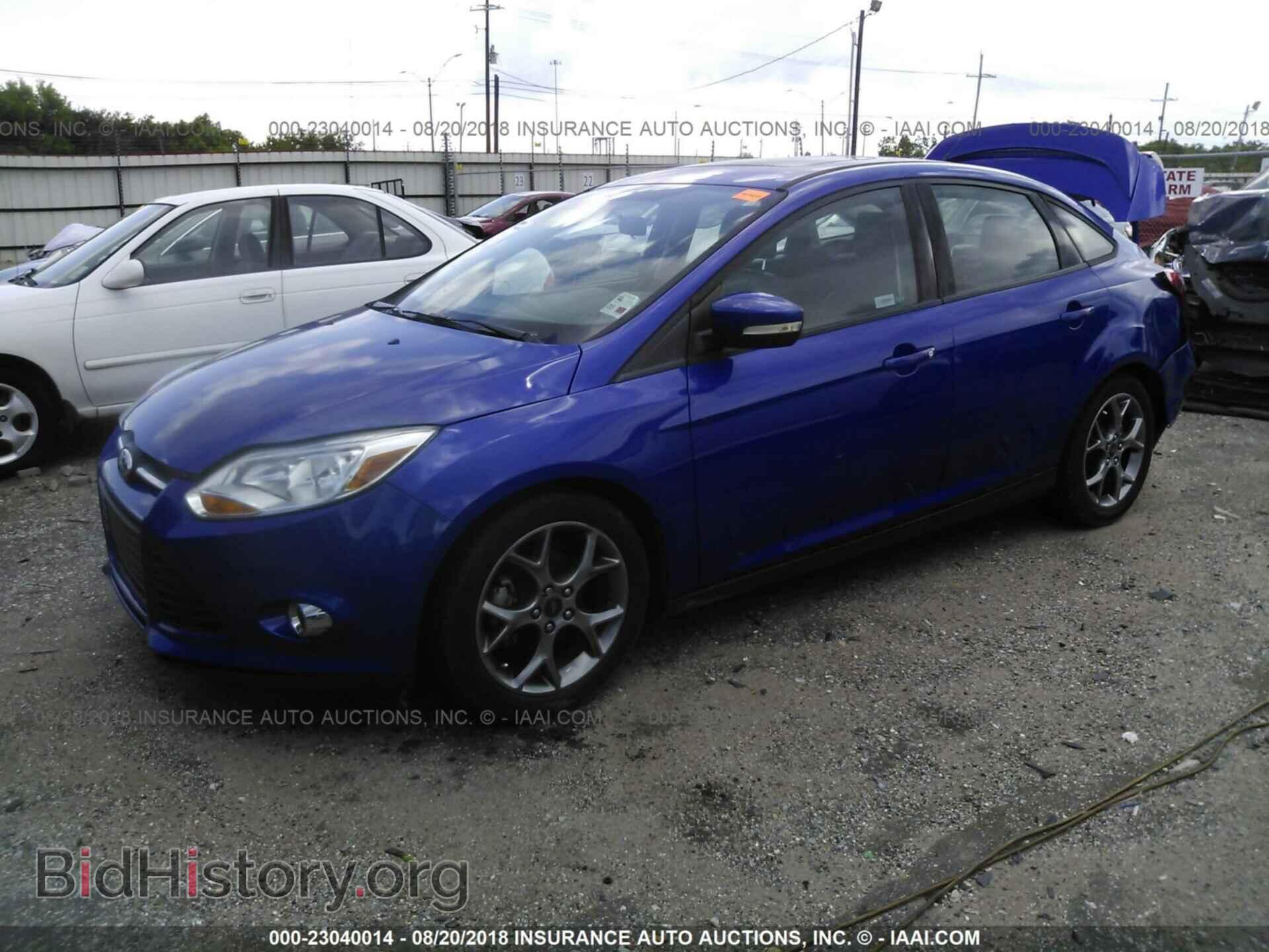 2014 Ford Focus - VIN: 1FADP3F20EL257873 - Фото 2