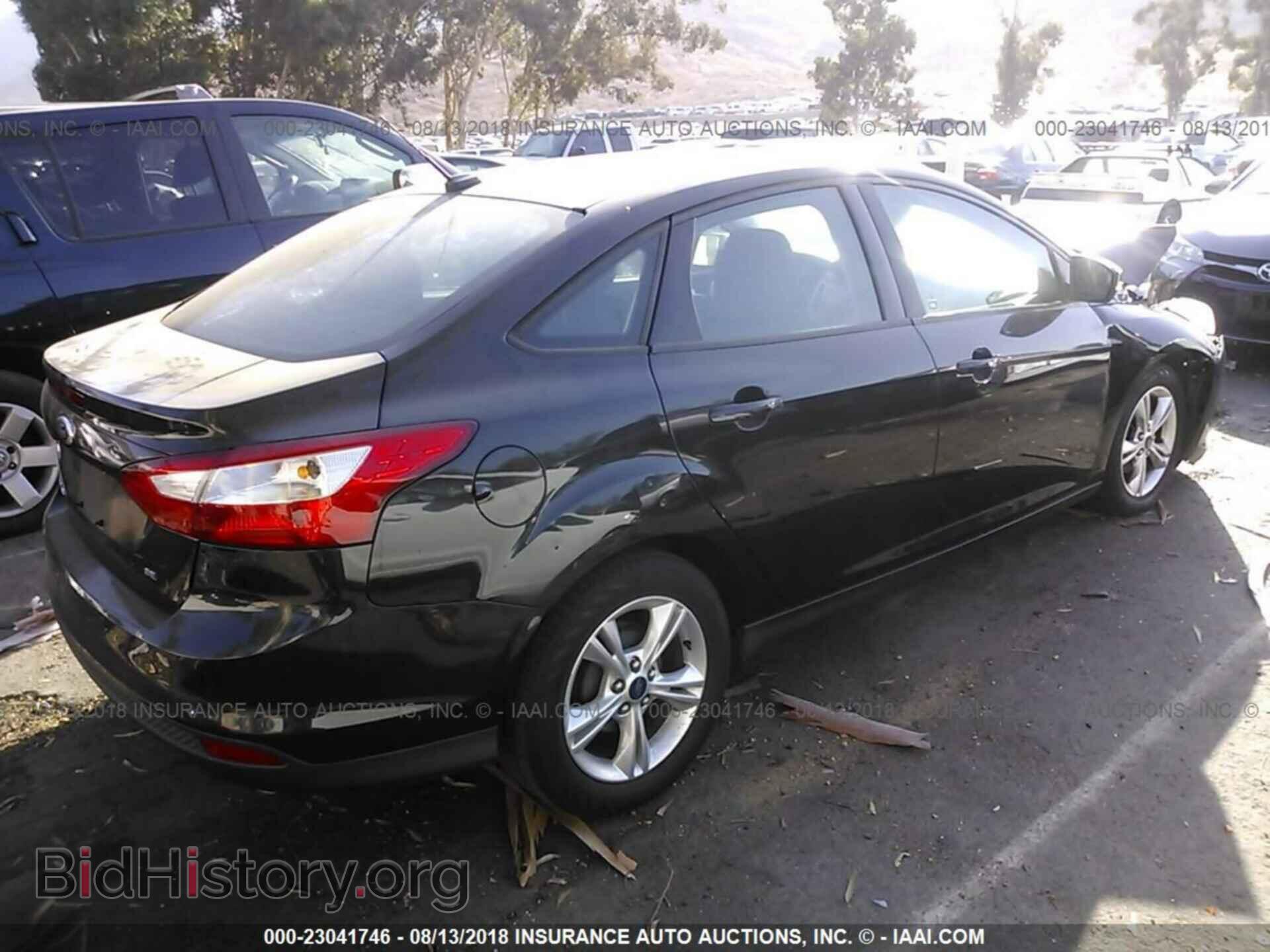 2013 Ford Focus - VIN: 1FADP3F25DL382138 - Photo 4