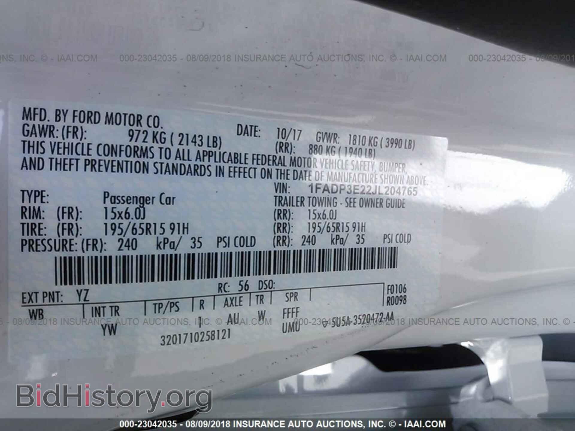 2018 Ford Focus - VIN: 1FADP3E22JL204765 - Фото 9