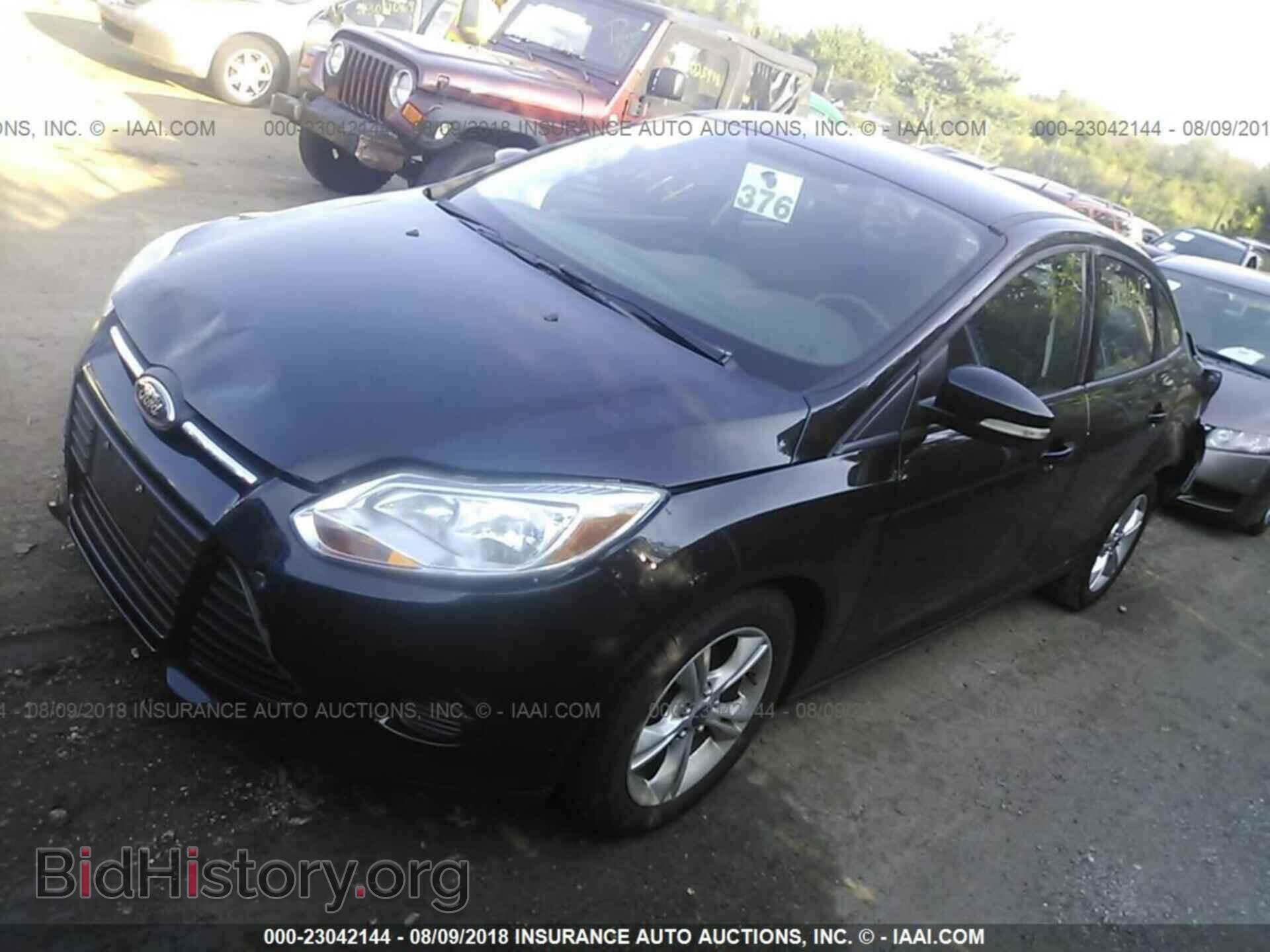 2014 Ford Focus - VIN: 1FADP3F20EL181359 - Фото 2