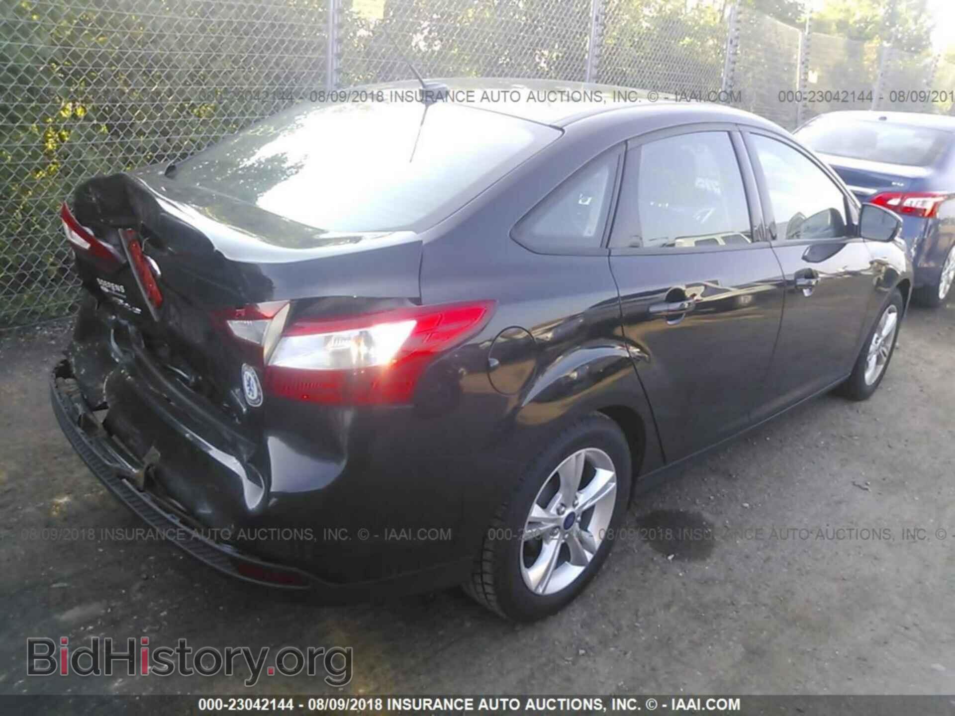 2014 Ford Focus - VIN: 1FADP3F20EL181359 - Фото 4