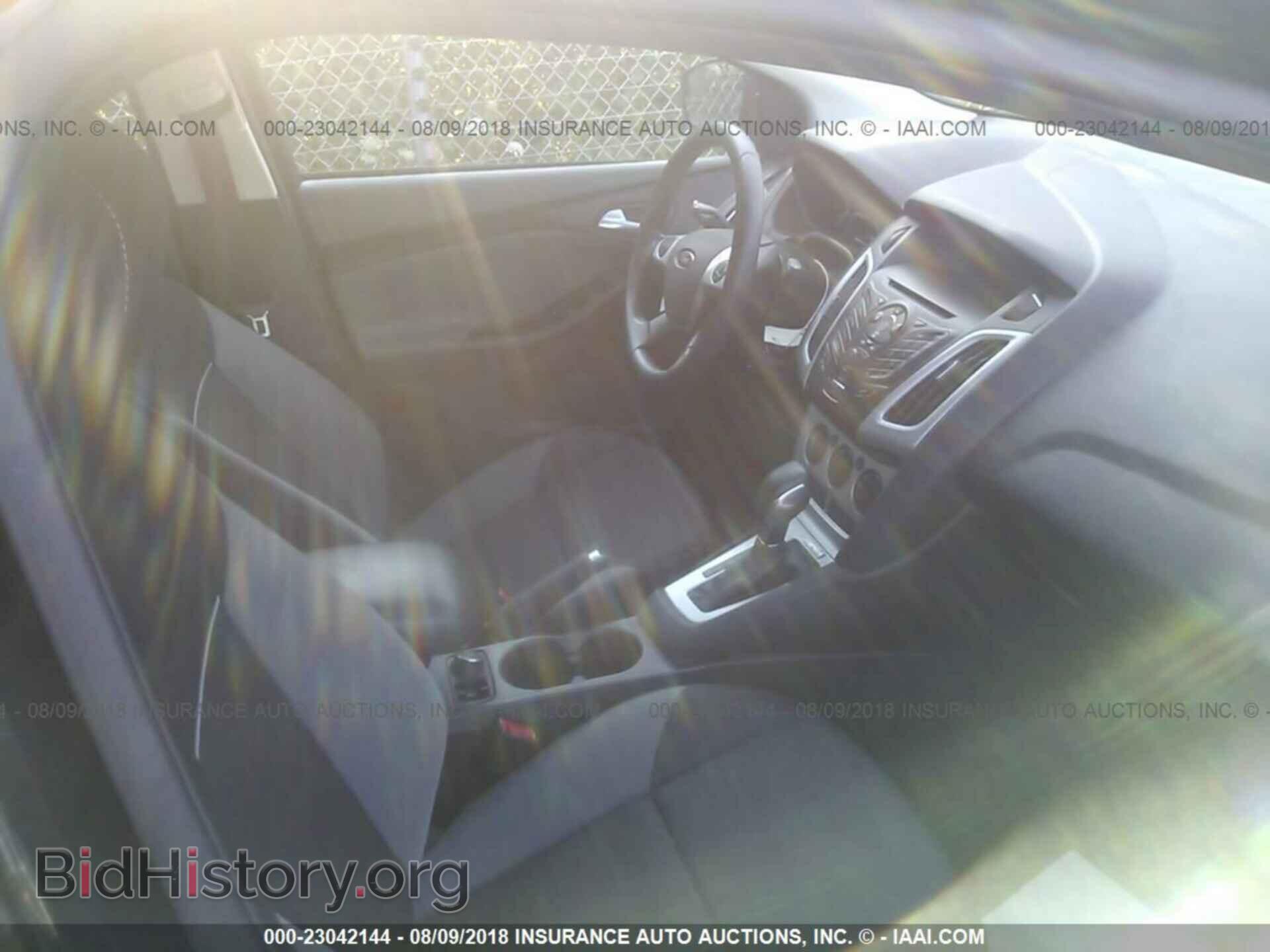 2014 Ford Focus - VIN: 1FADP3F20EL181359 - Фото 5