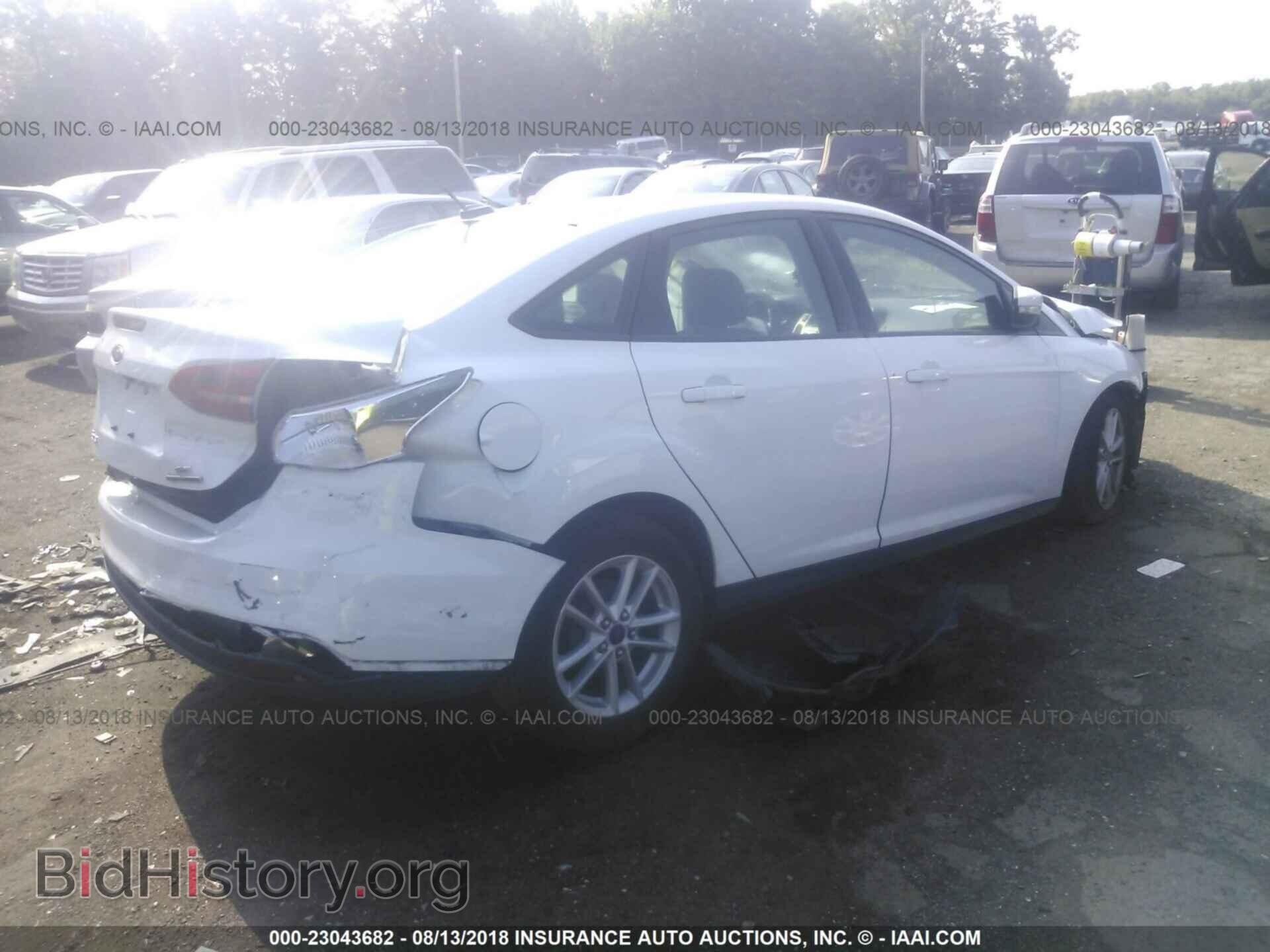 2015 Ford Focus - VIN: 1FADP3F28FL243625 - Photo 4