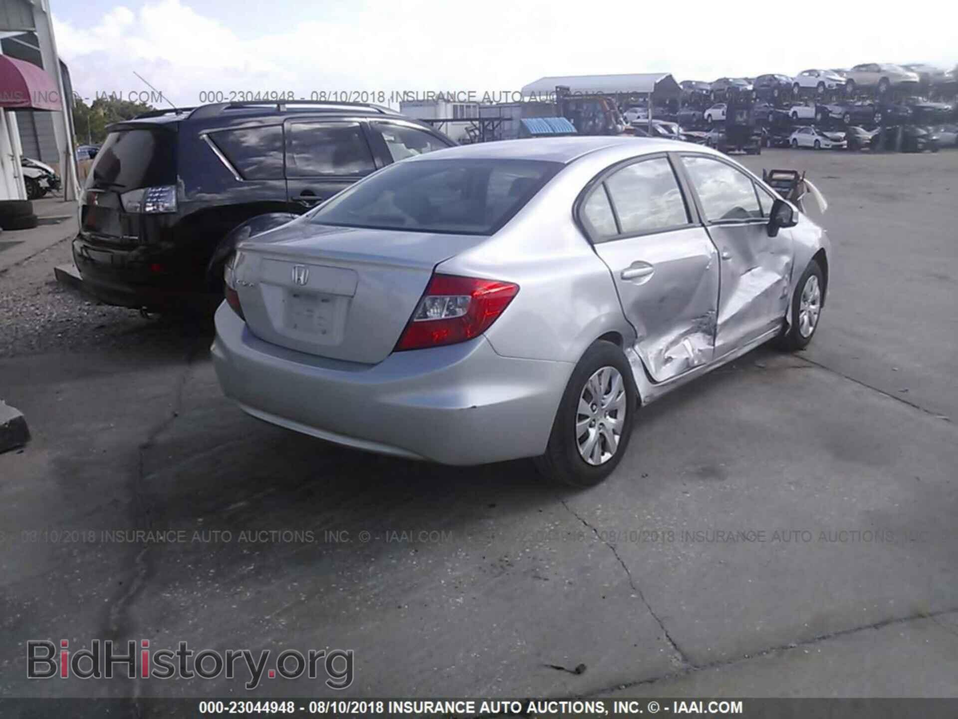 2012 Honda Civic - VIN: 19XFB2F59CE374945 - Photo 4