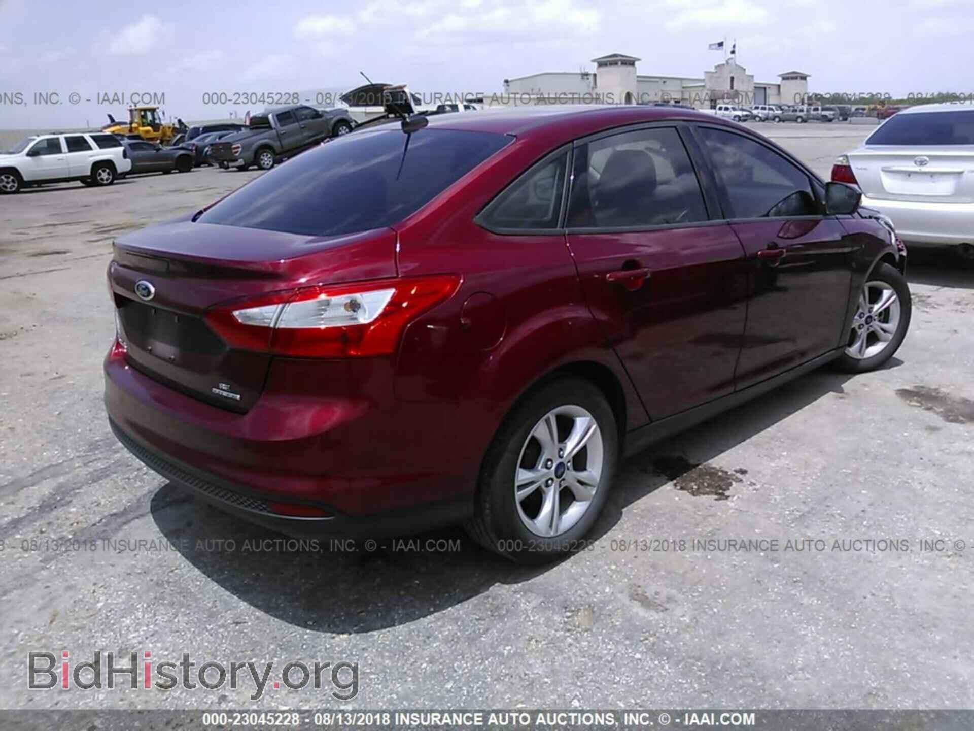 2014 Ford Focus - VIN: 1FADP3F26EL293549 - Photo 4