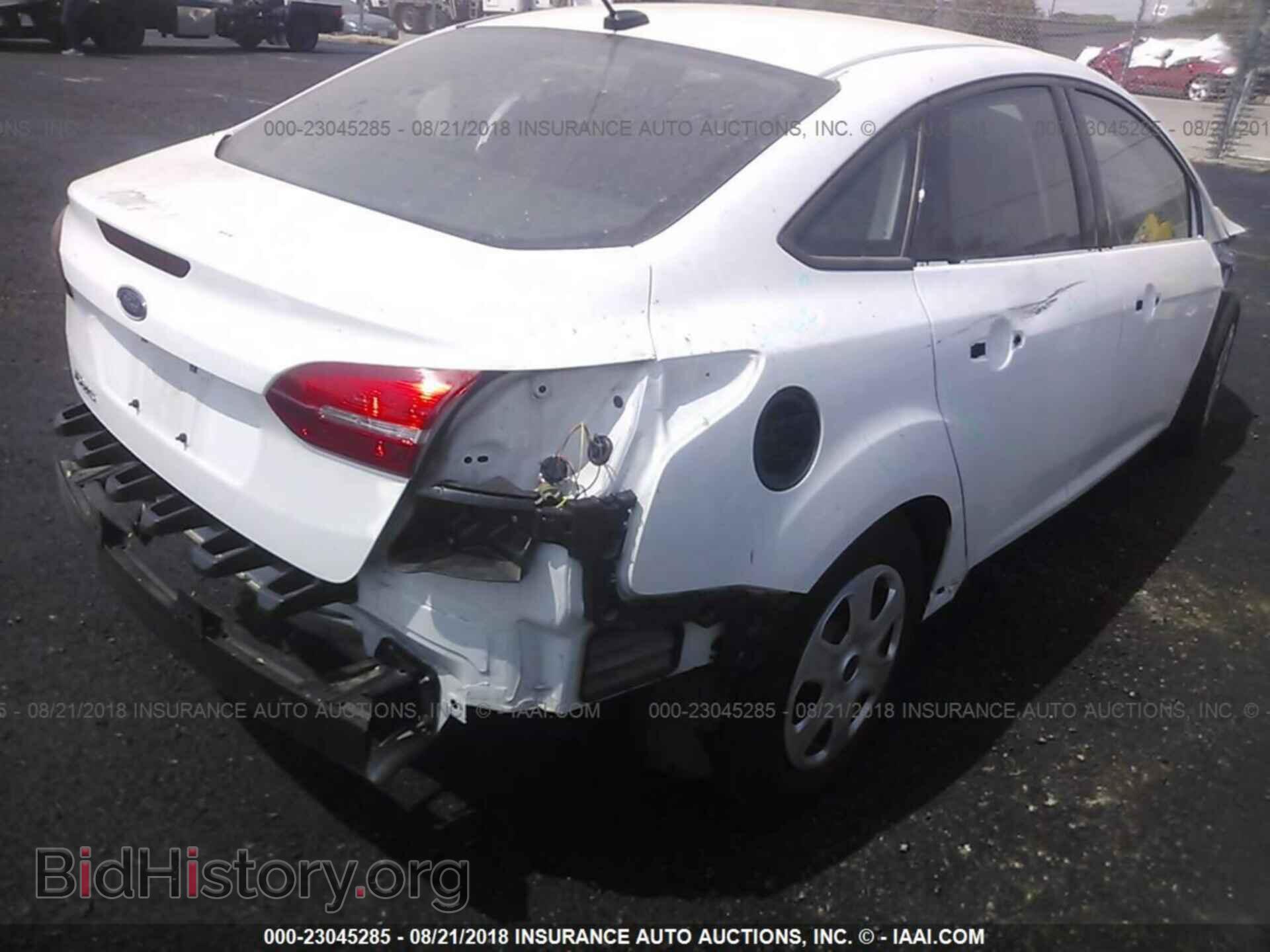 2015 Ford Focus - VIN: 1FADP3E25FL262120 - Фото 4
