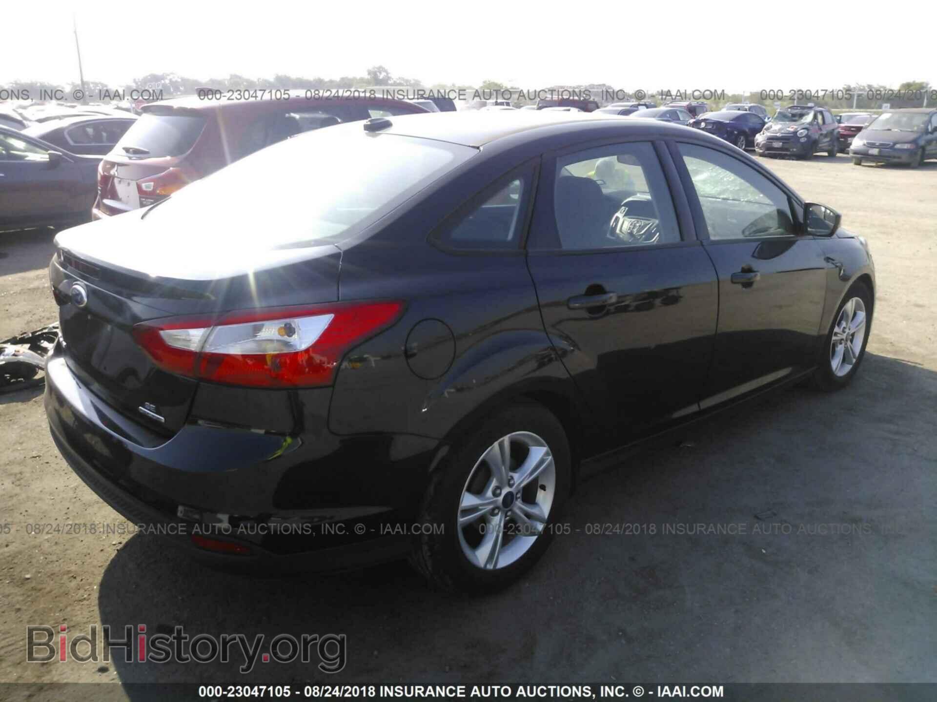 2014 Ford Focus - VIN: 1FADP3F28EL175003 - Фото 4