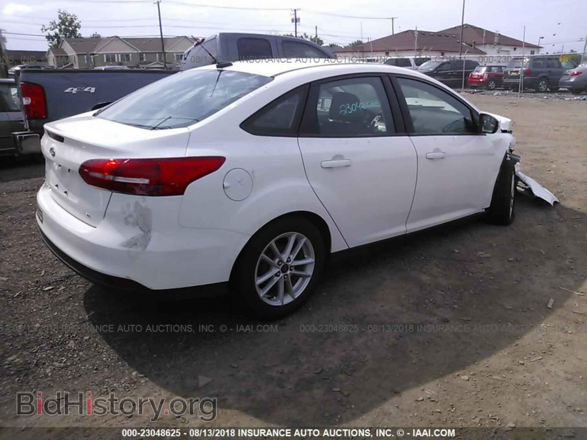 2015 Ford Focus - VIN: 1FADP3F22FL217151 - Photo 4