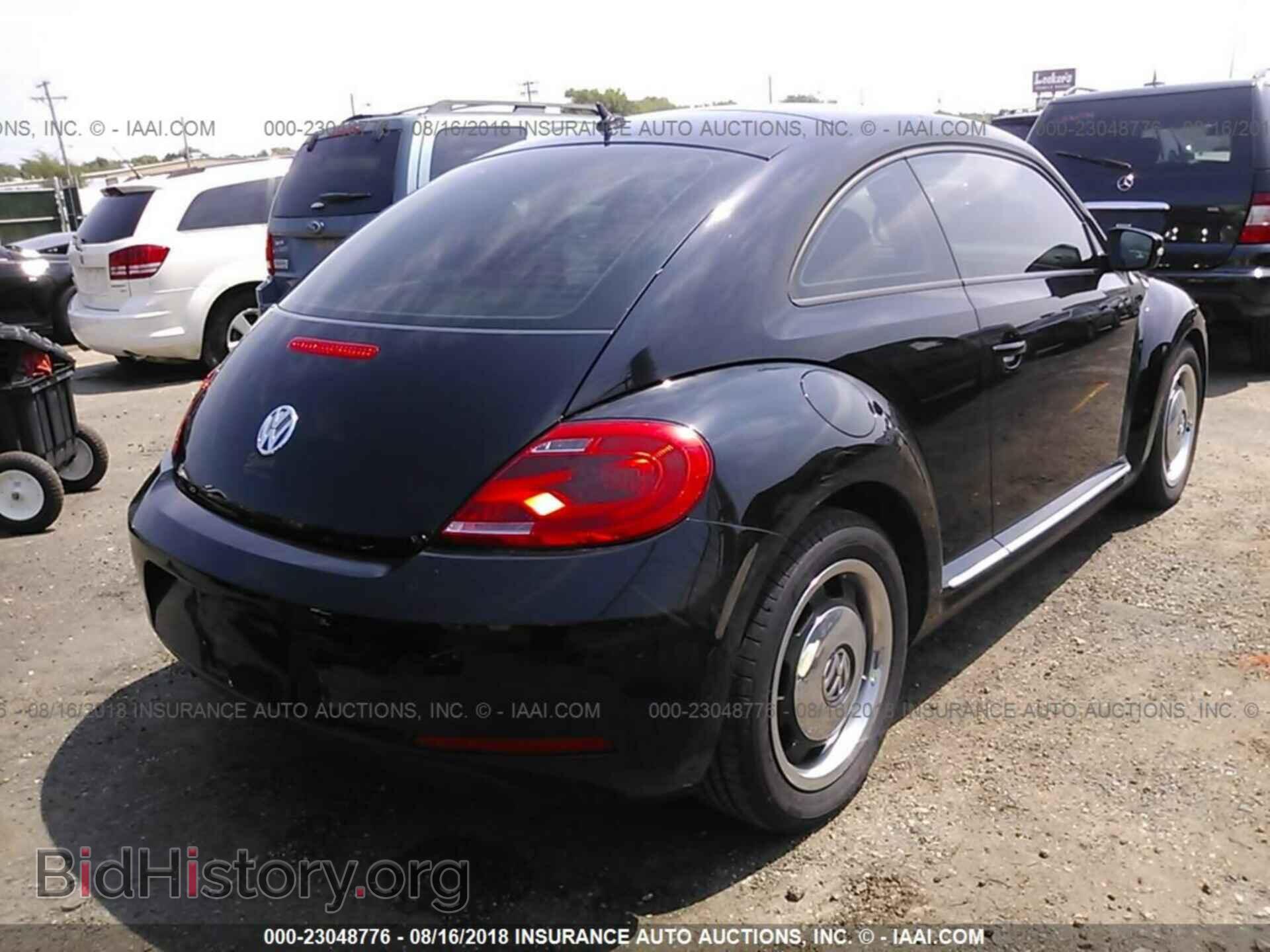 2012 Volkswagen Beetle - VIN: 3VWJP7AT1CM628472 - Фото 4