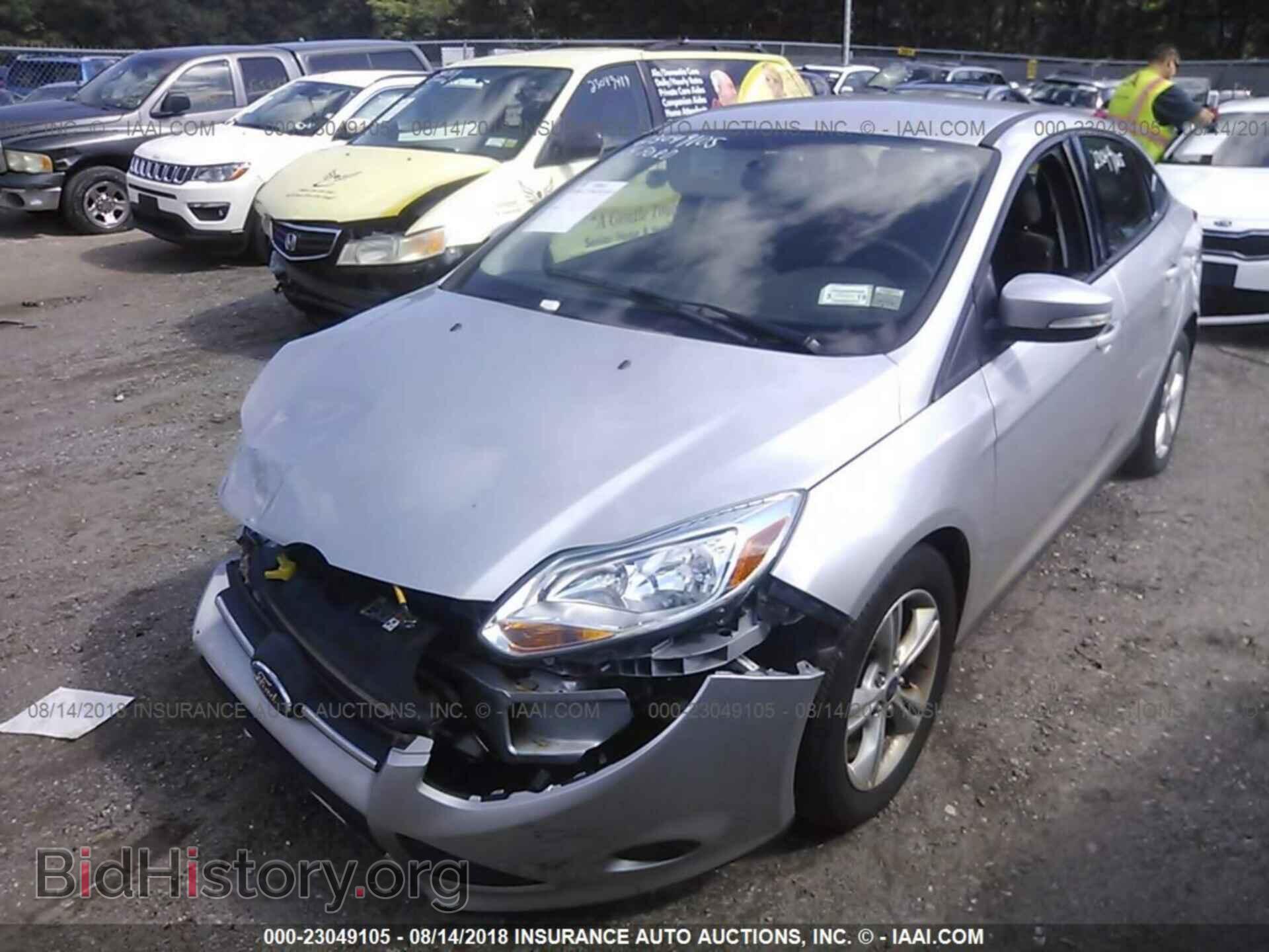 2014 Ford Focus - VIN: 1FADP3F20EL435152 - Фото 2