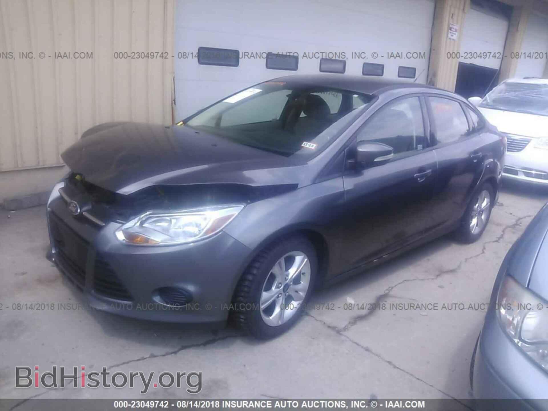 2014 Ford Focus - VIN: 1FADP3F27EL244571 - Фото 2