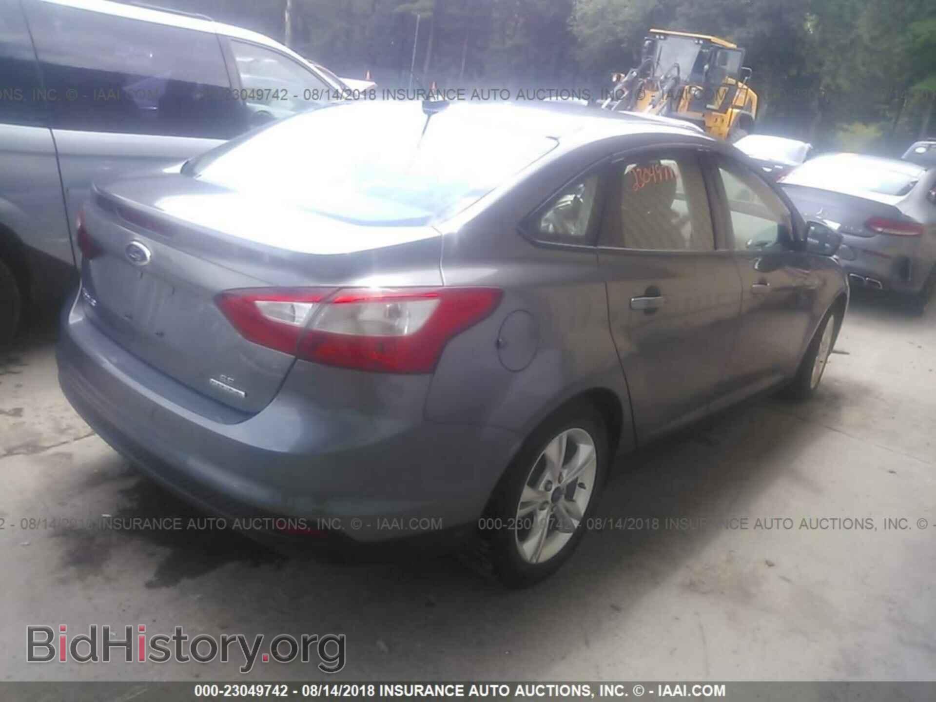 2014 Ford Focus - VIN: 1FADP3F27EL244571 - Фото 4