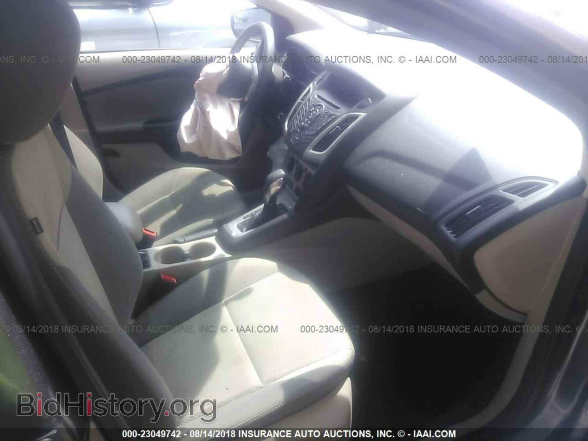 2014 Ford Focus - VIN: 1FADP3F27EL244571 - Фото 5