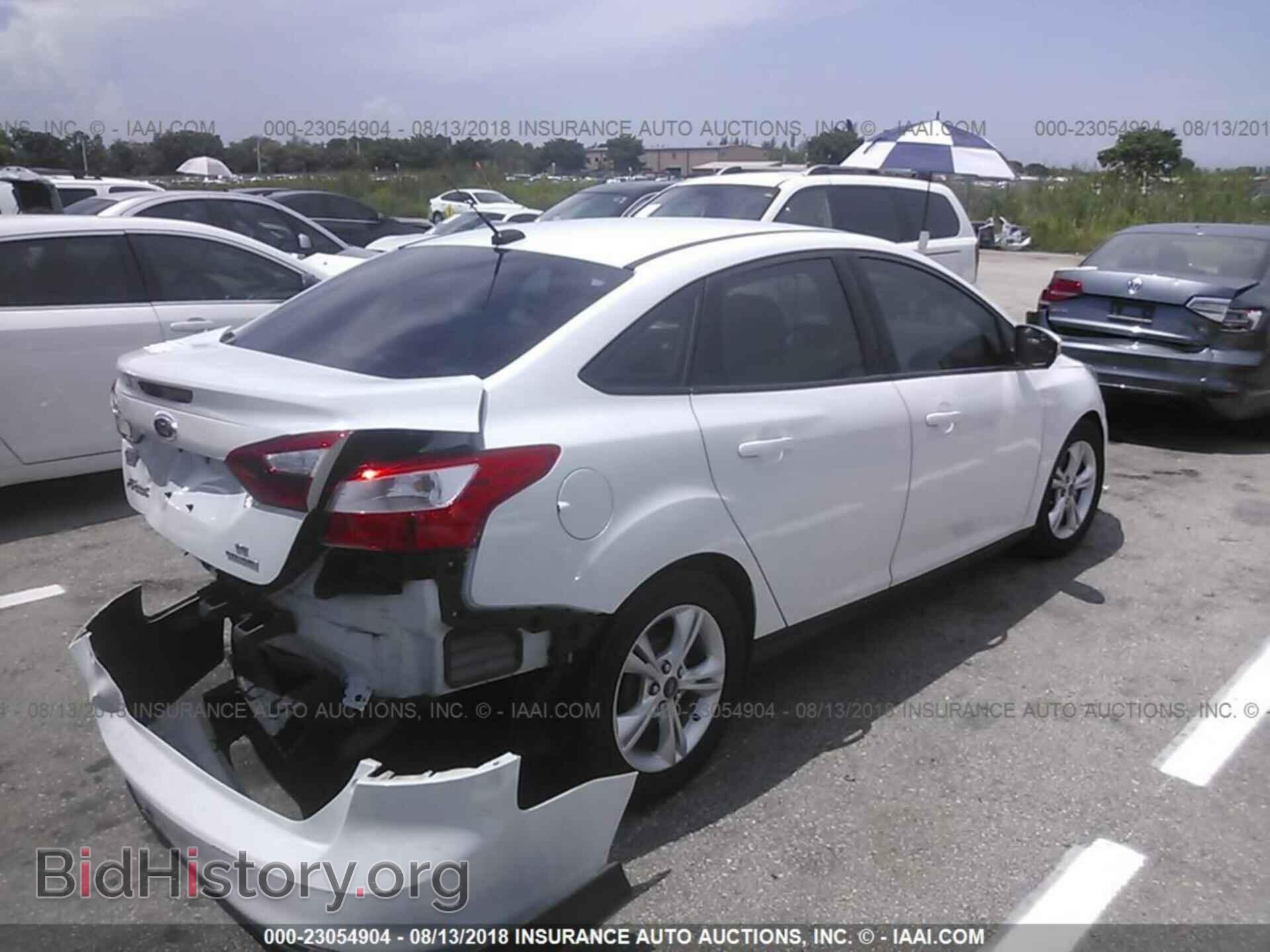 2014 Ford Focus - VIN: 1FADP3F28EL270340 - Фото 4
