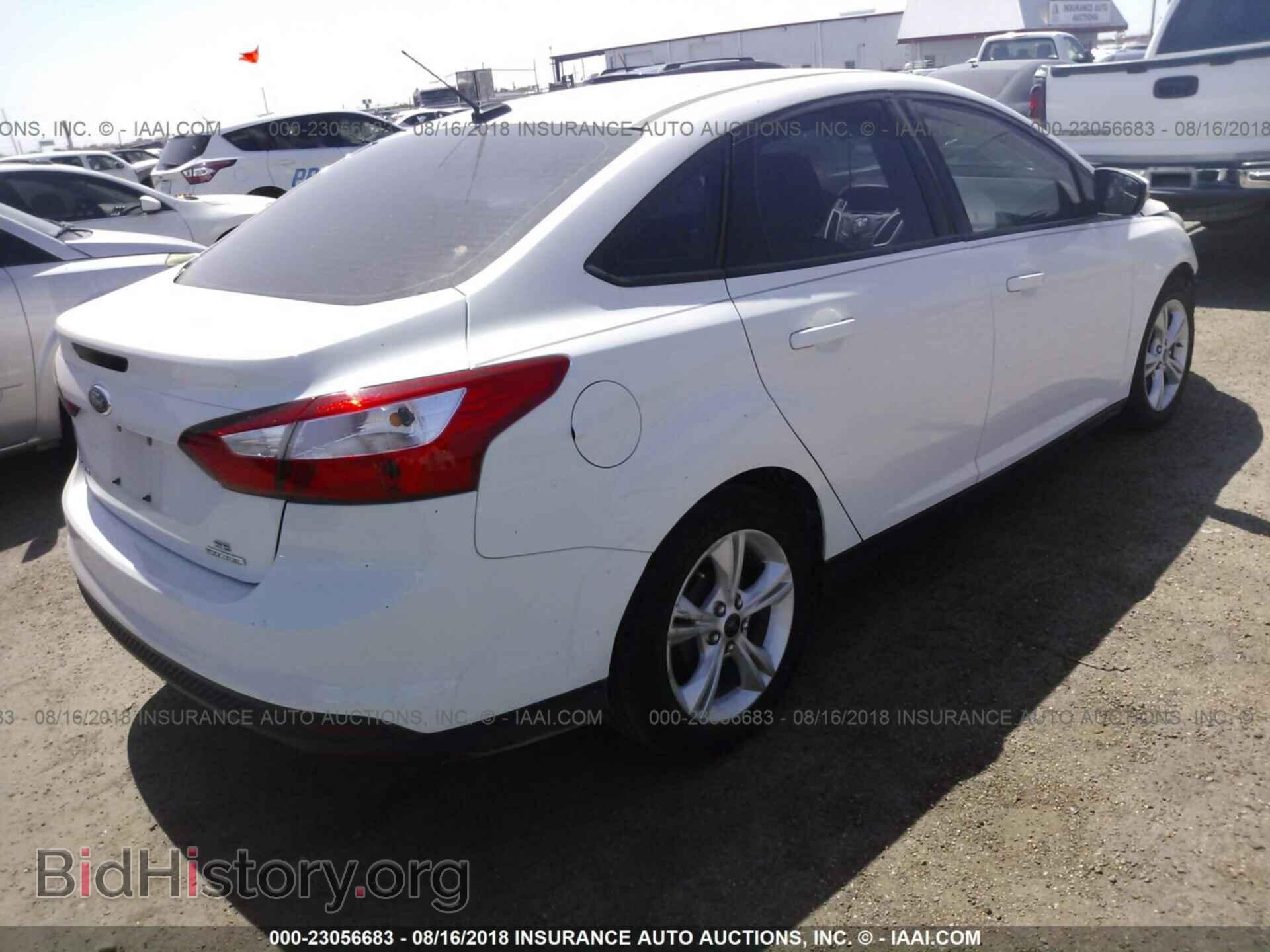 2014 Ford Focus - VIN: 1FADP3F28EL419698 - Photo 4