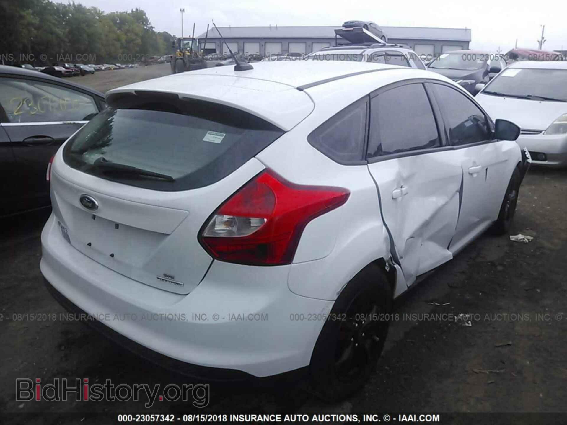 2014 Ford Focus - VIN: 1FADP3K29EL136362 - Фото 4