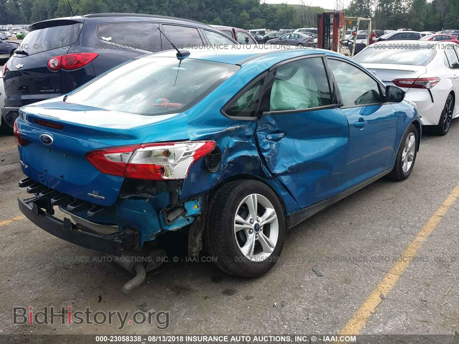 2014 Ford Focus - VIN: 1FADP3F29EL450409 - Photo 4