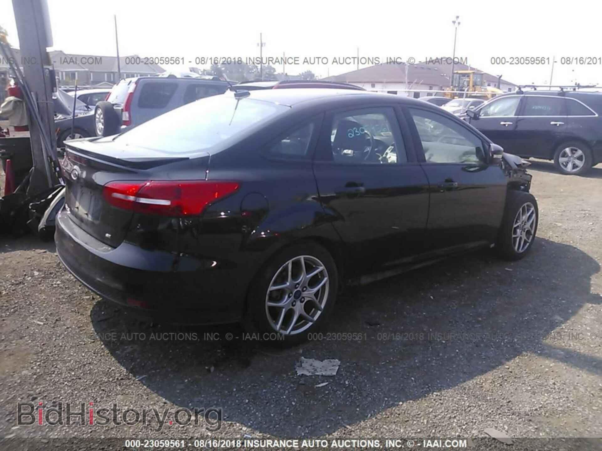 2015 Ford Focus - VIN: 1FADP3F27FL268290 - Photo 4