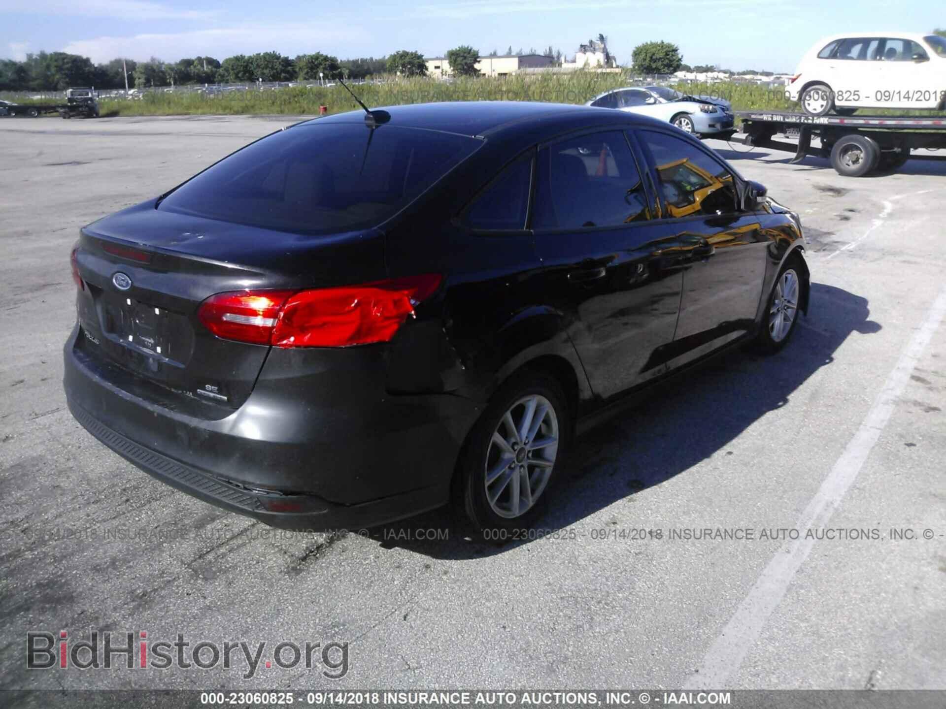 2015 Ford Focus - VIN: 1FADP3F2XFL243318 - Фото 4