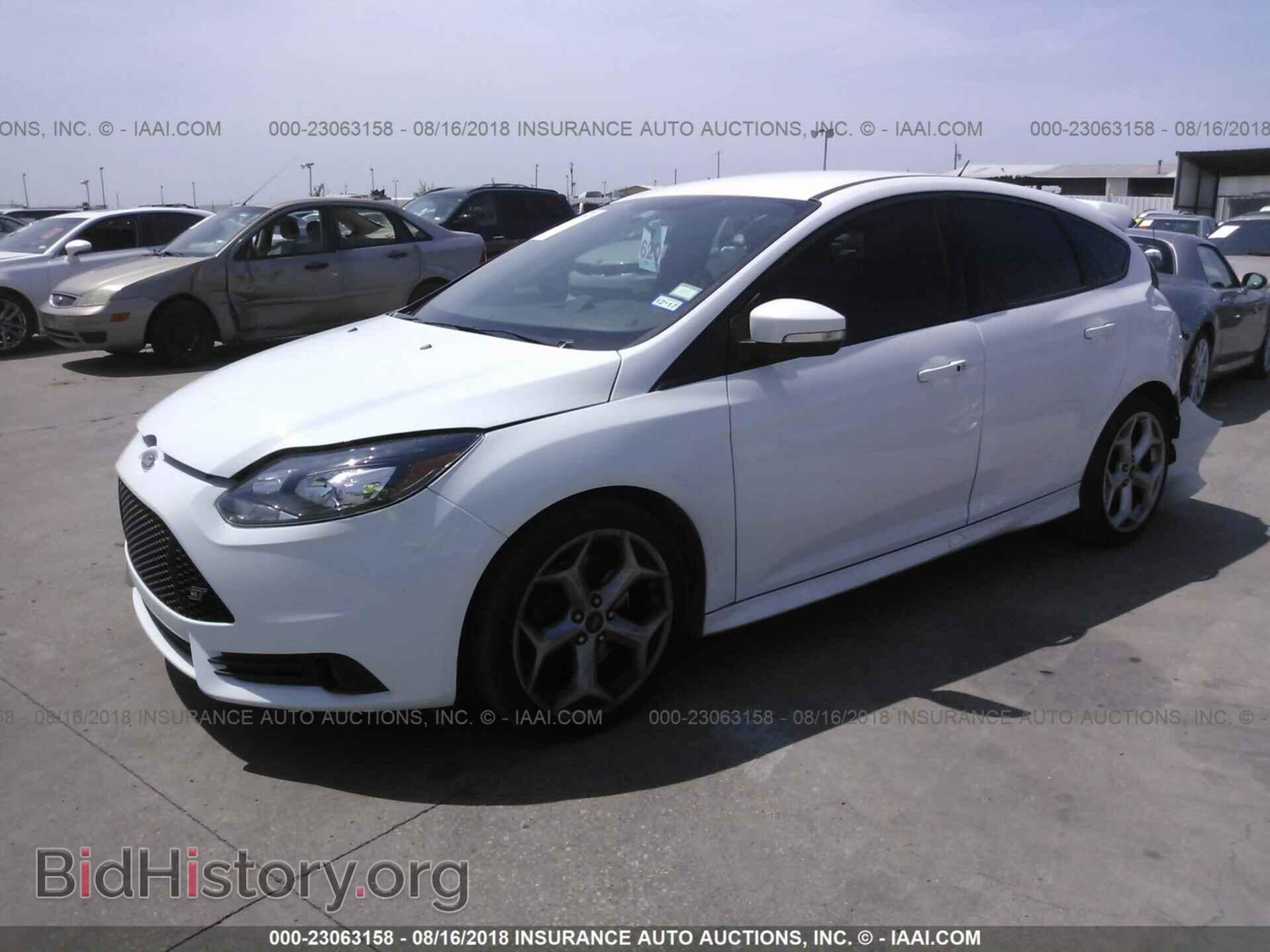 2014 Ford Focus - VIN: 1FADP3L98EL117345 - Фото 2