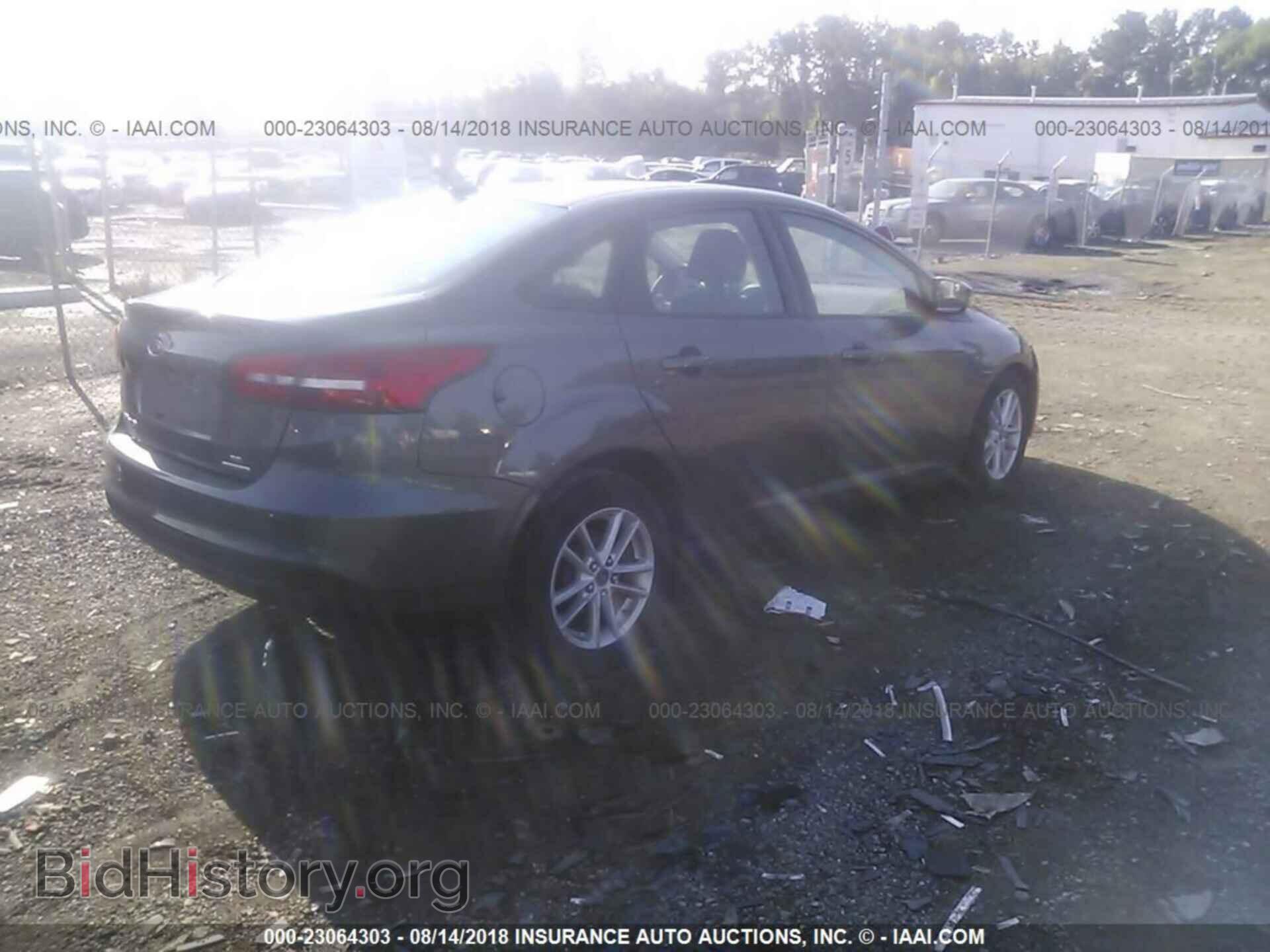 2015 Ford Focus - VIN: 1FADP3F22FL209423 - Photo 4