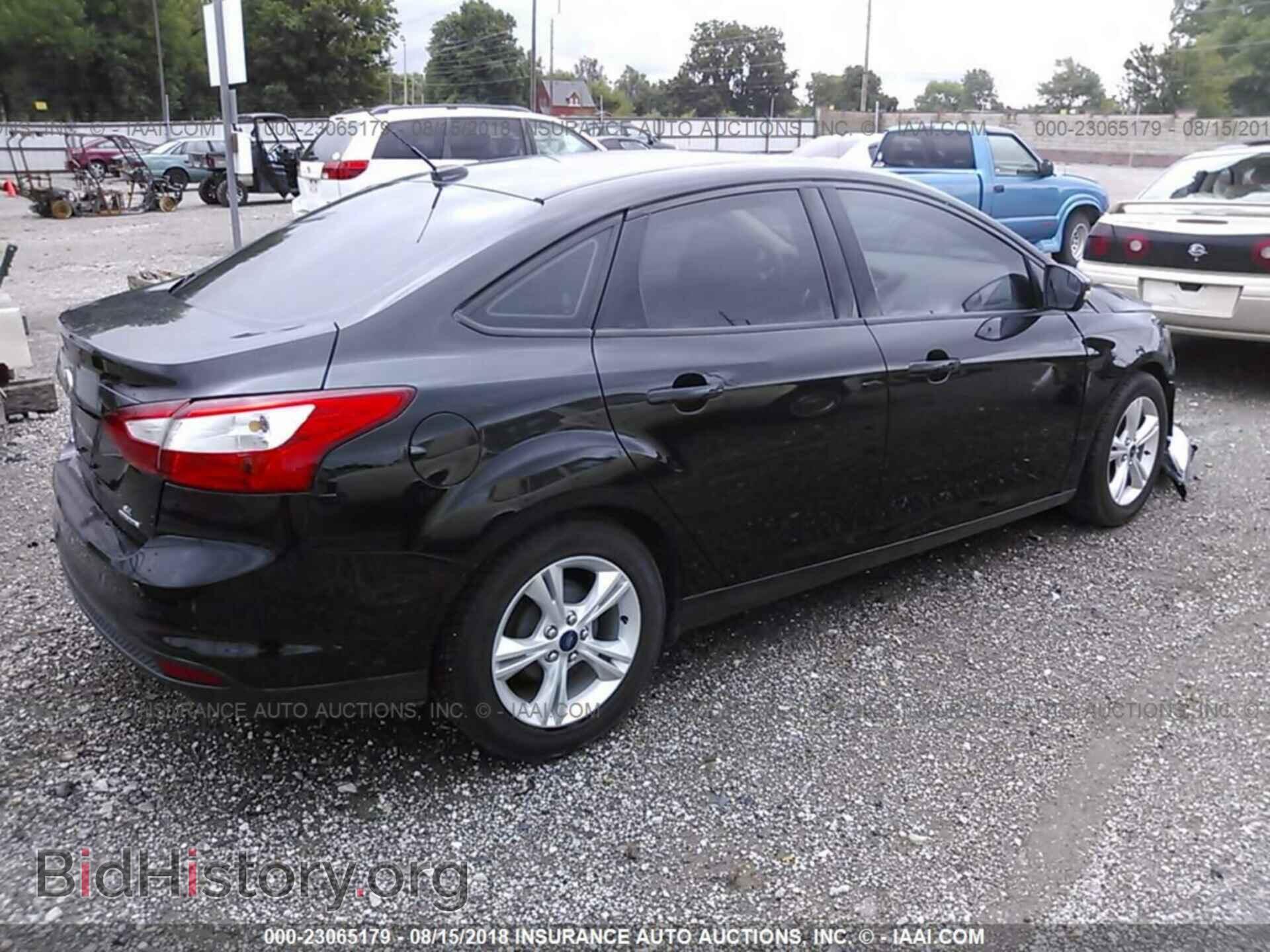 2014 Ford Focus - VIN: 1FADP3F29EL430886 - Фото 4