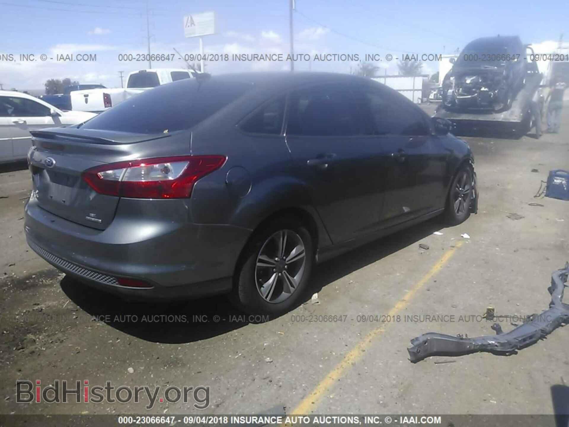 2014 Ford Focus - VIN: 1FADP3F28EL413450 - Photo 4