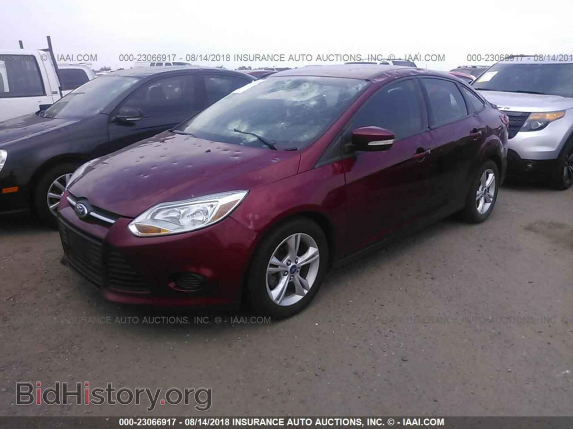 2014 Ford Focus - VIN: 1FADP3F20EL141525 - Photo 2