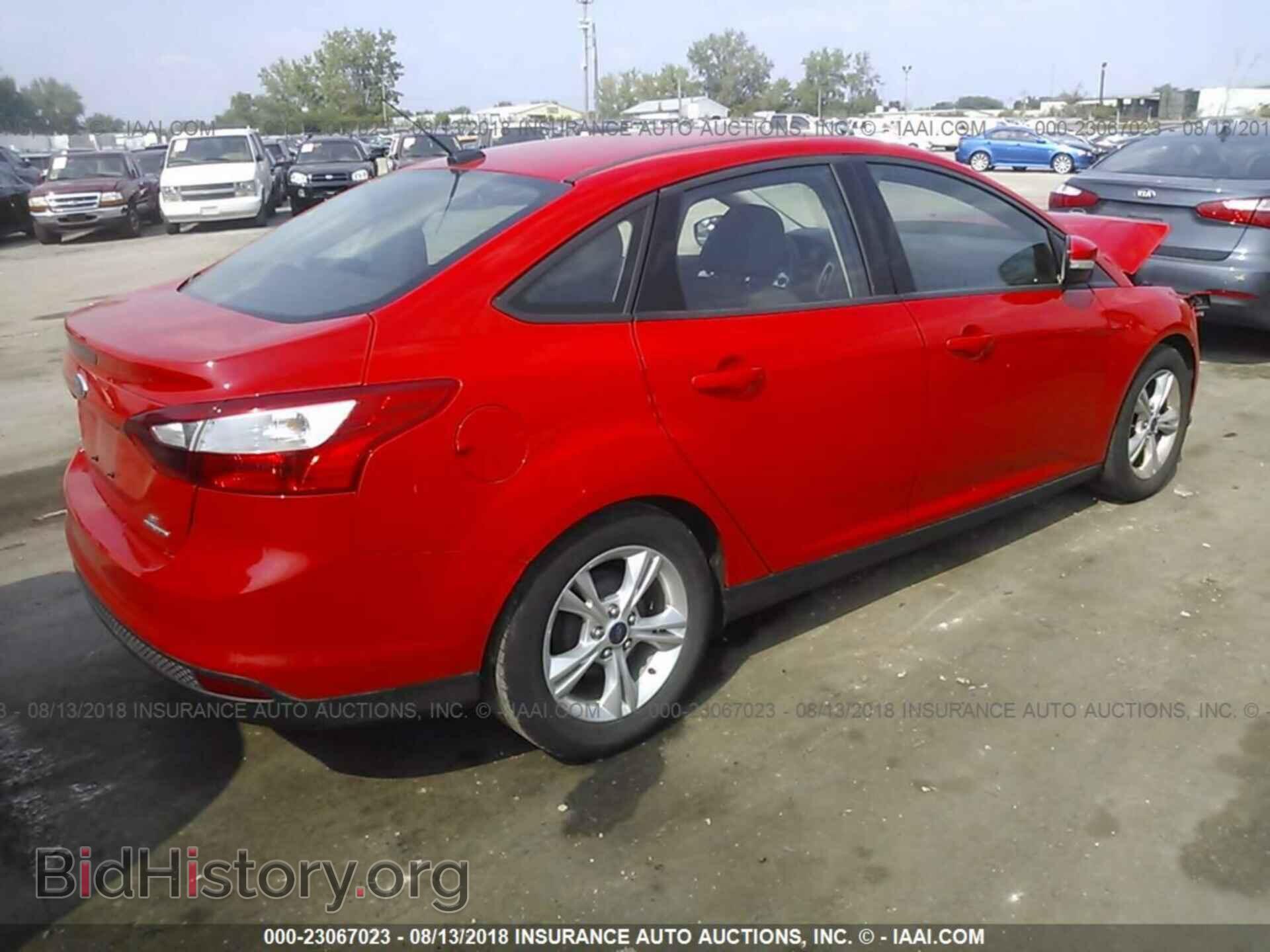 2014 Ford Focus - VIN: 1FADP3F29EL220062 - Фото 4