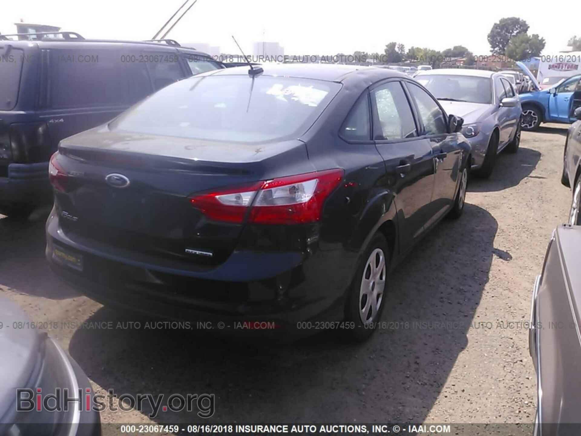 2013 Ford Focus - VIN: 1FADP3E2XDL161135 - Photo 4