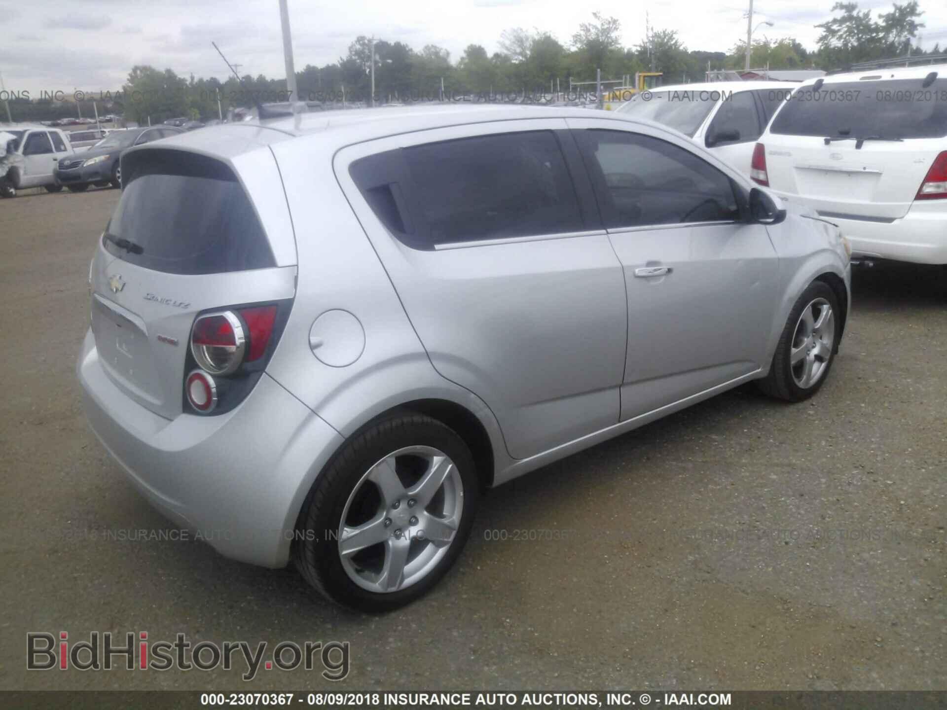 2014 Chevrolet Sonic - VIN: 1G1JE6SB4E4130007 - Photo 4