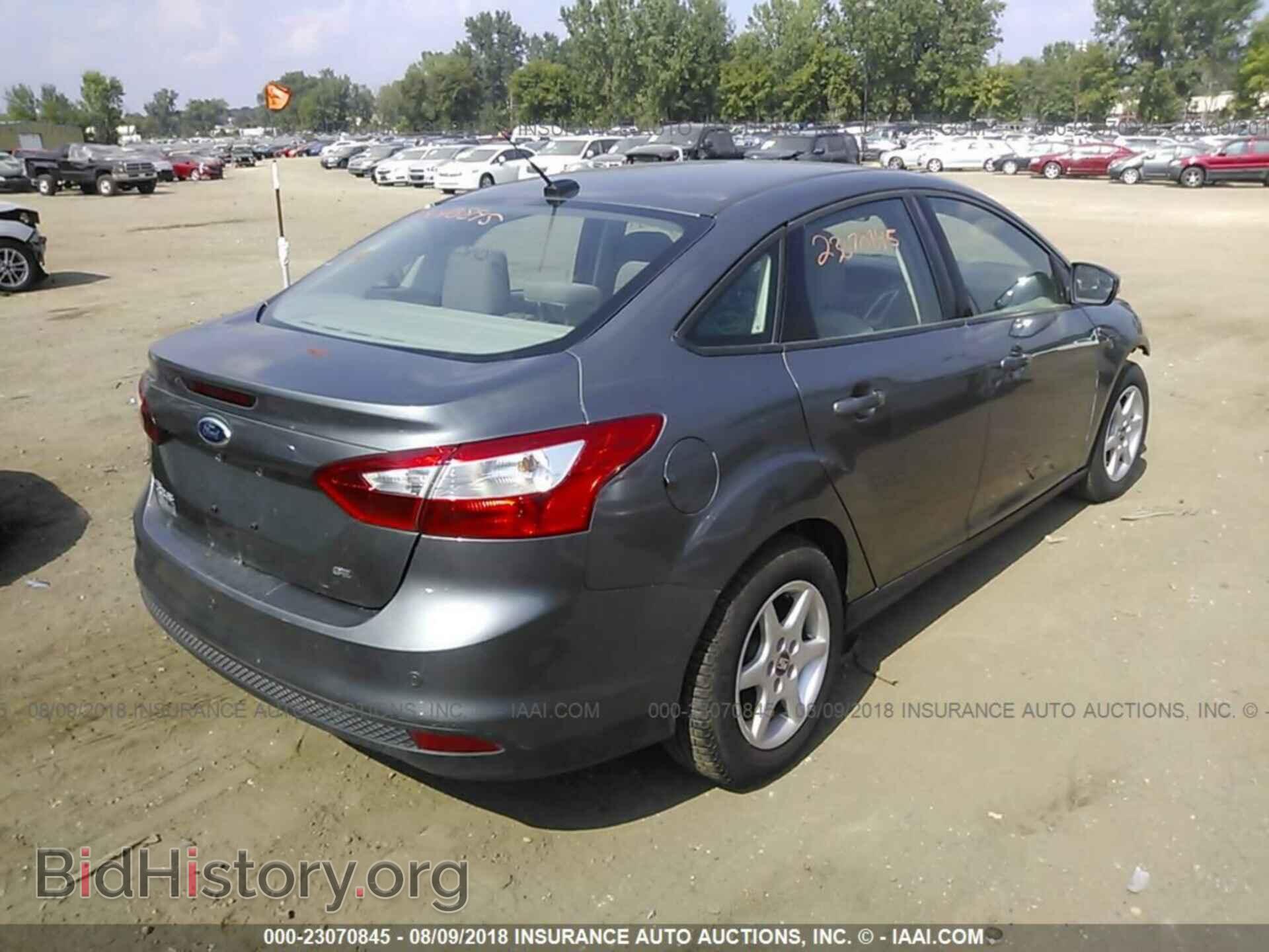 2014 Ford Focus - VIN: 1FADP3F29EL424814 - Фото 4
