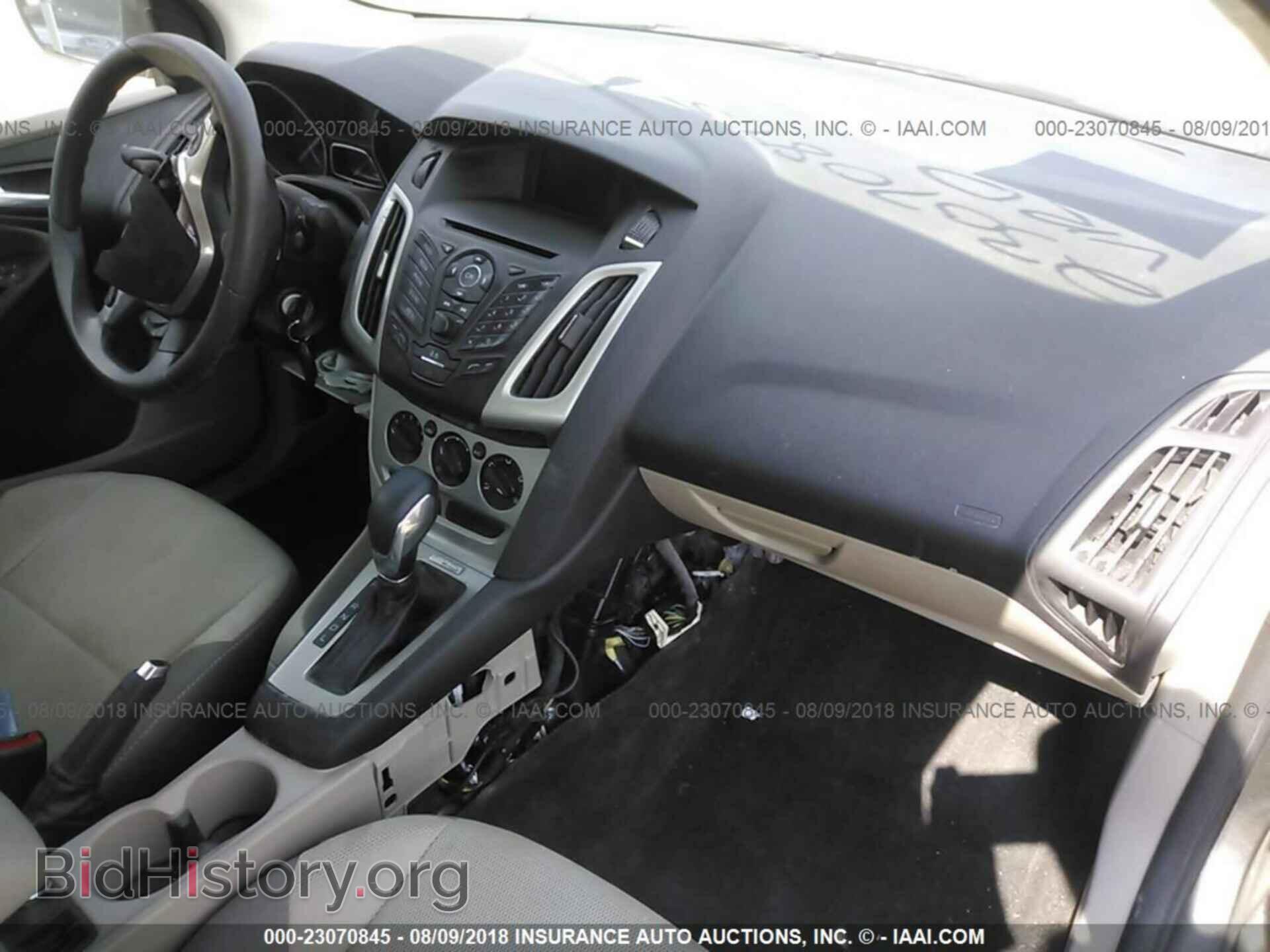 2014 Ford Focus - VIN: 1FADP3F29EL424814 - Фото 5