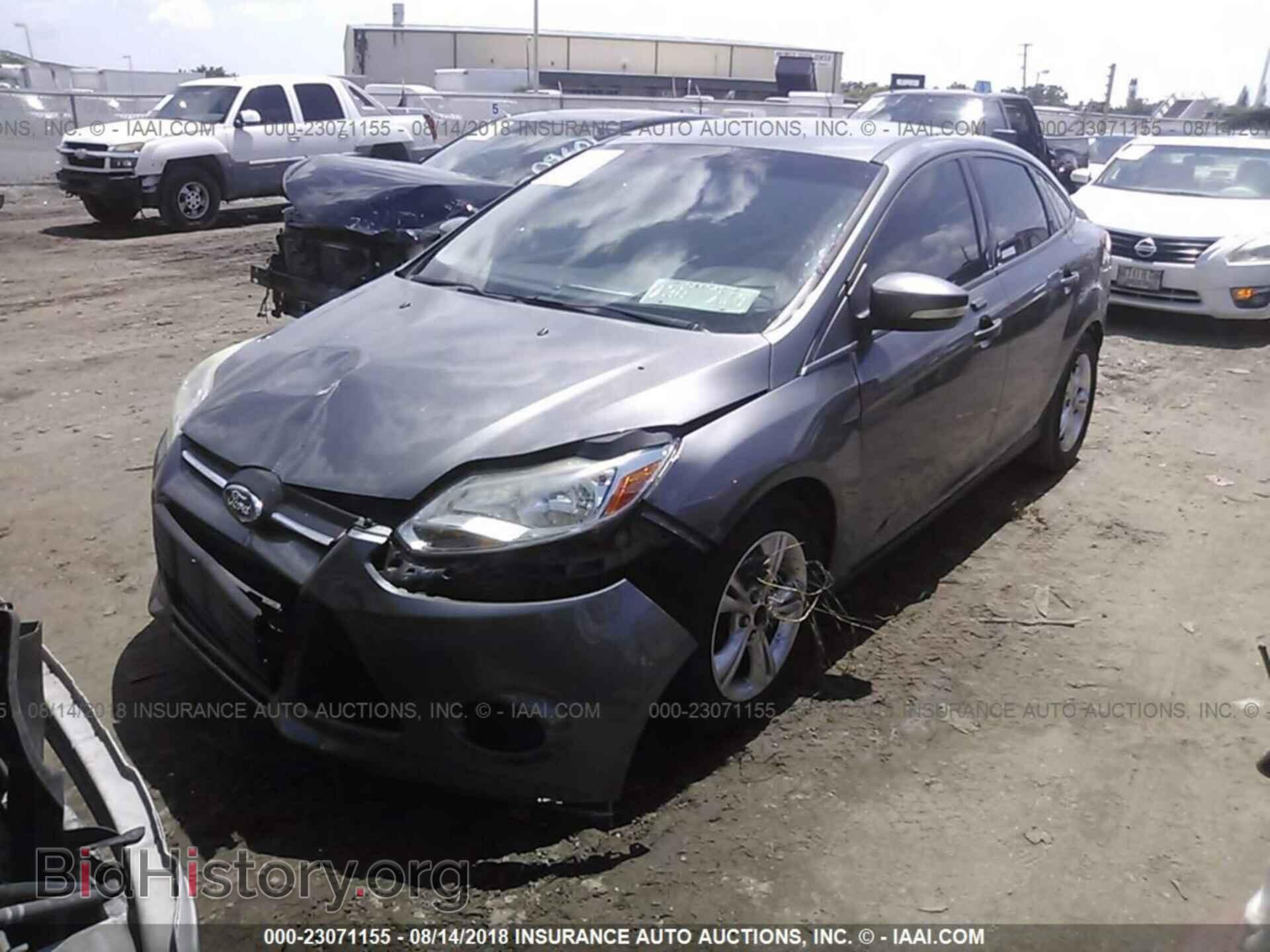 2014 Ford Focus - VIN: 1FADP3F29EL216352 - Фото 2