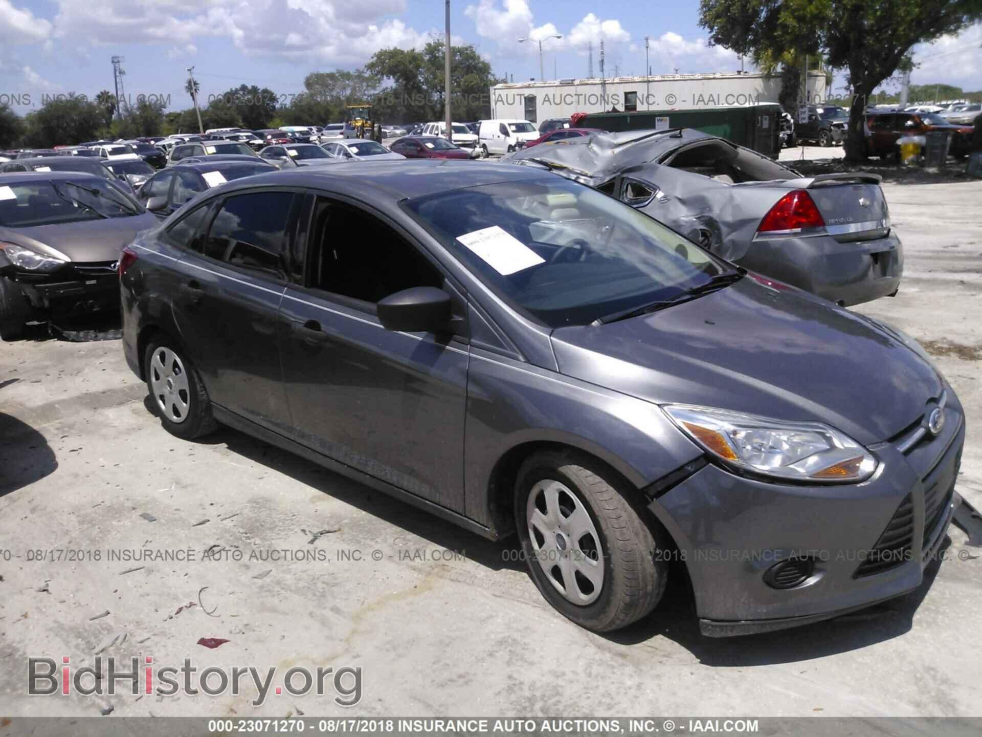 Фотография 1FADP3E26EL142230 - Ford Focus 2014