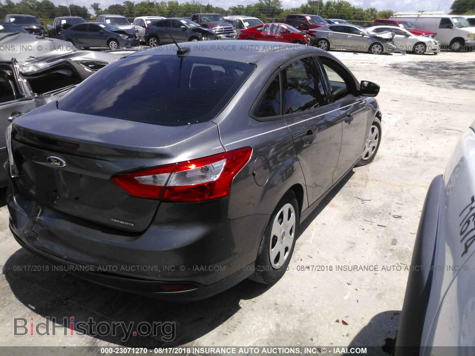 2014 Ford Focus - VIN: 1FADP3E26EL142230 - Фото 4