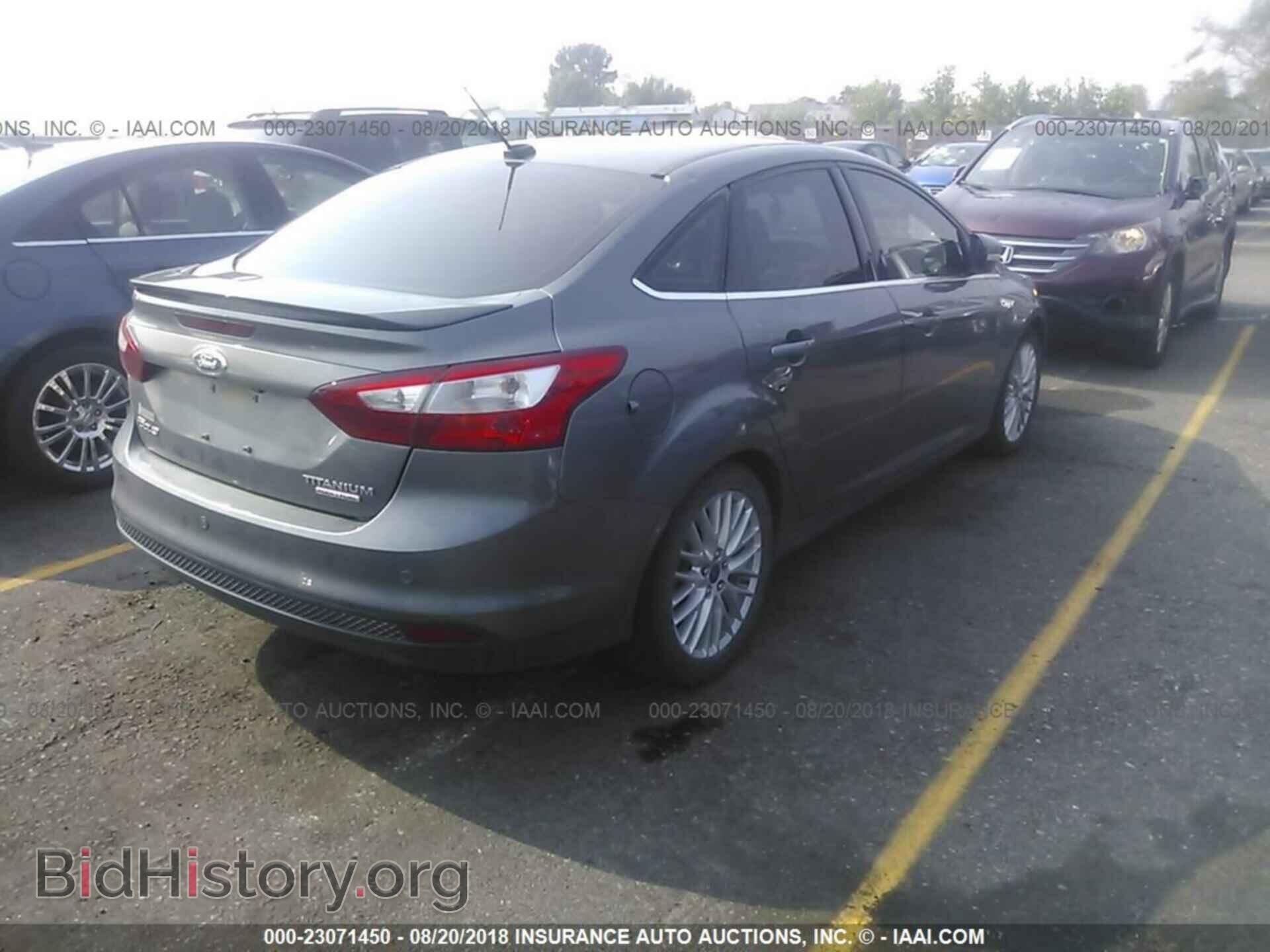 2014 Ford Focus - VIN: 1FADP3J21EL155960 - Фото 4