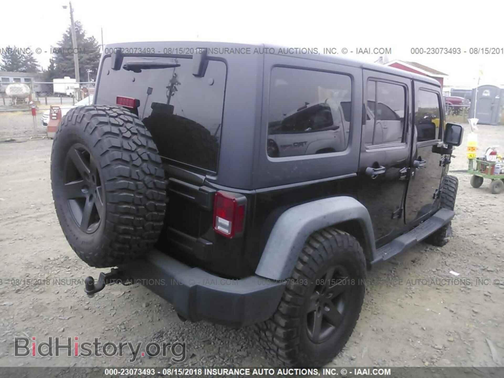 2011 Jeep Wrangler - VIN: 1J4BA3H13BL597841 - Фото 4