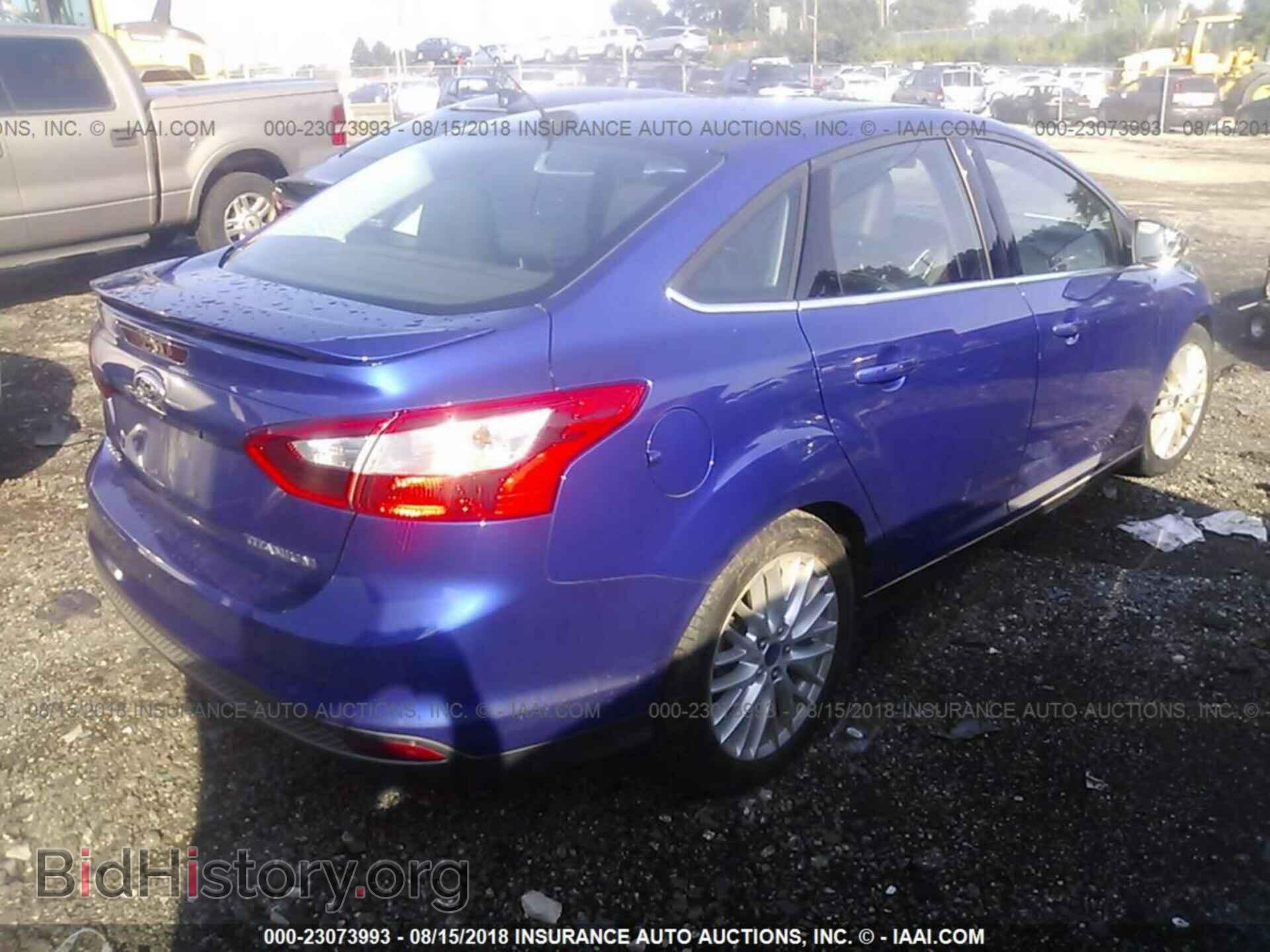 2014 Ford Focus - VIN: 1FADP3J20EL338539 - Фото 4