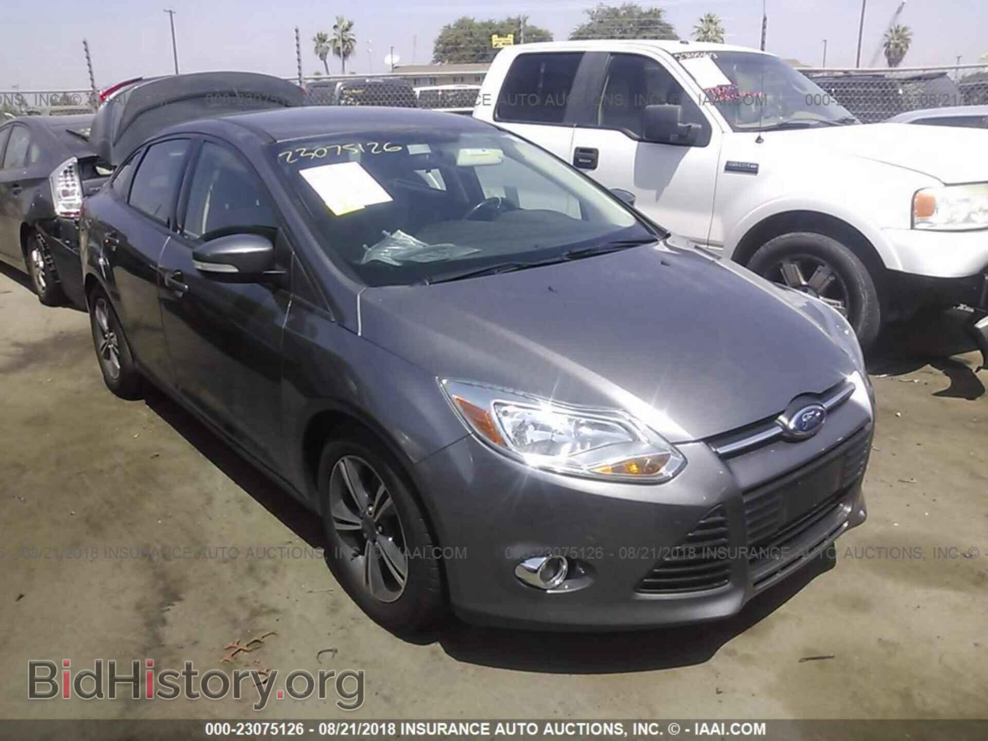 Photo 1FADP3F29EL357552 - Ford Focus 2014