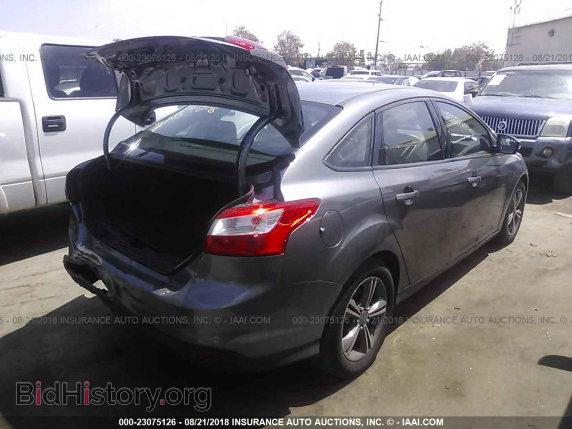 2014 Ford Focus - VIN: 1FADP3F29EL357552 - Photo 4