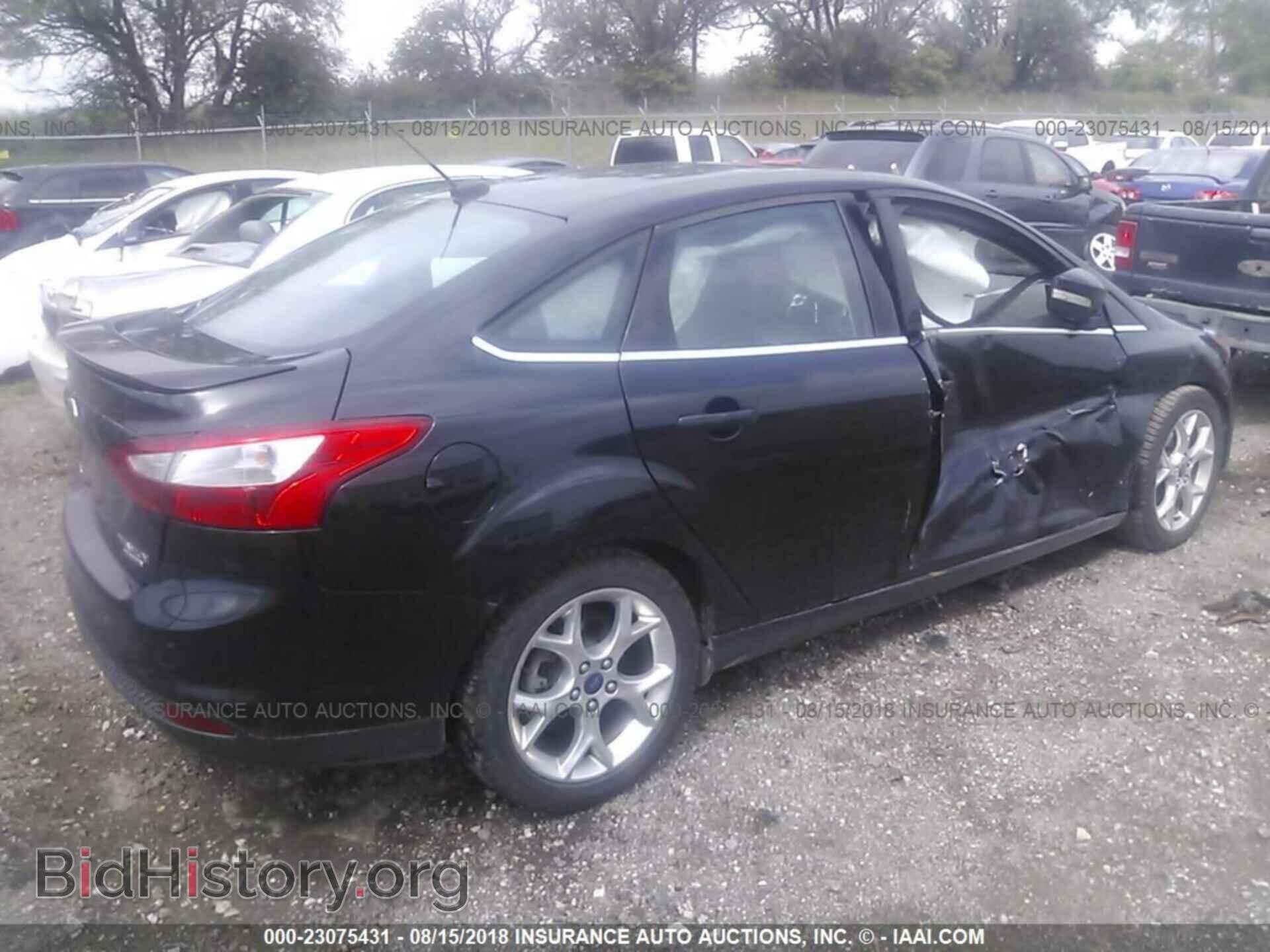 2014 Ford Focus - VIN: 1FADP3J20EL463332 - Фото 4