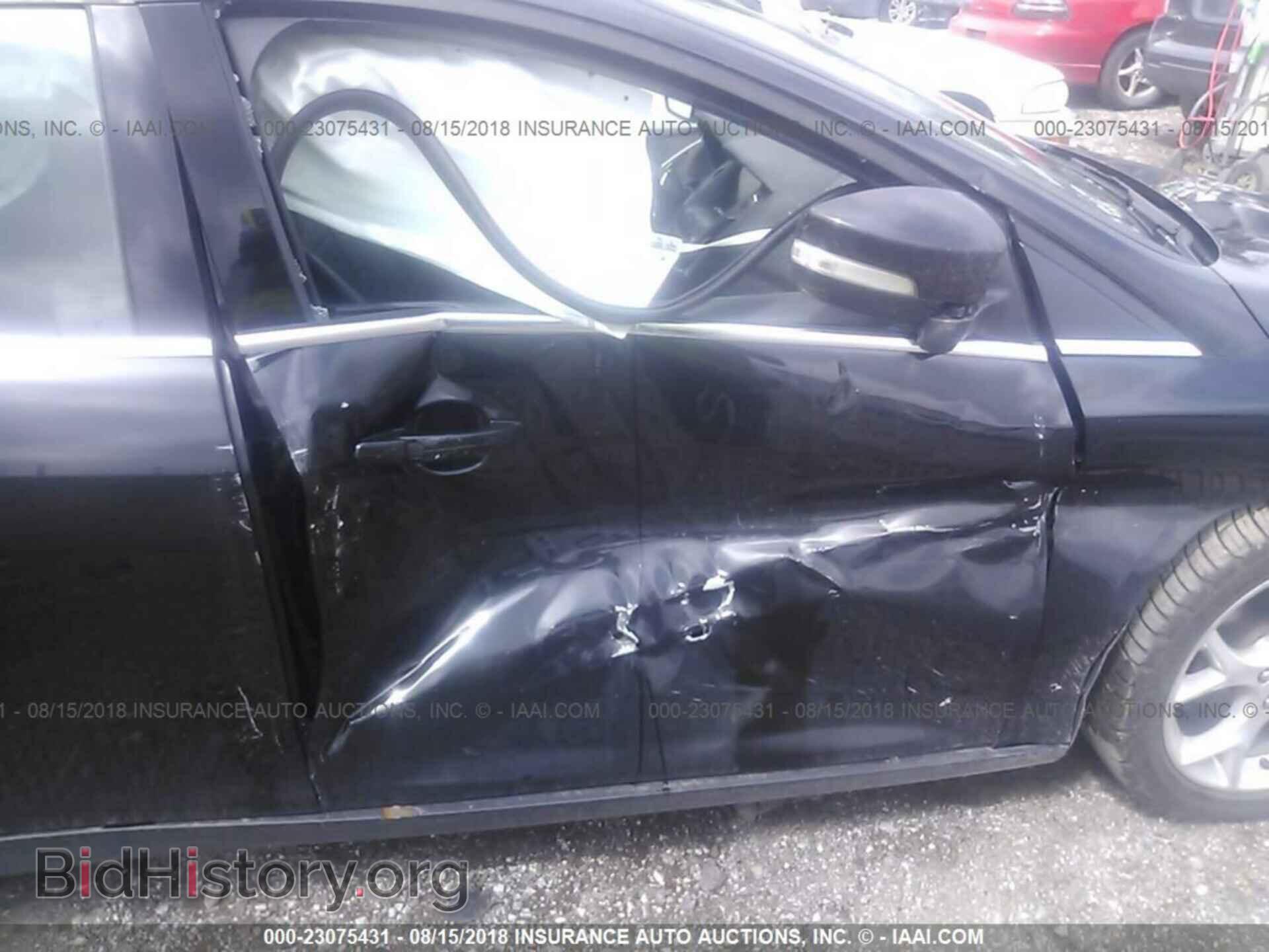 2014 Ford Focus - VIN: 1FADP3J20EL463332 - Фото 6